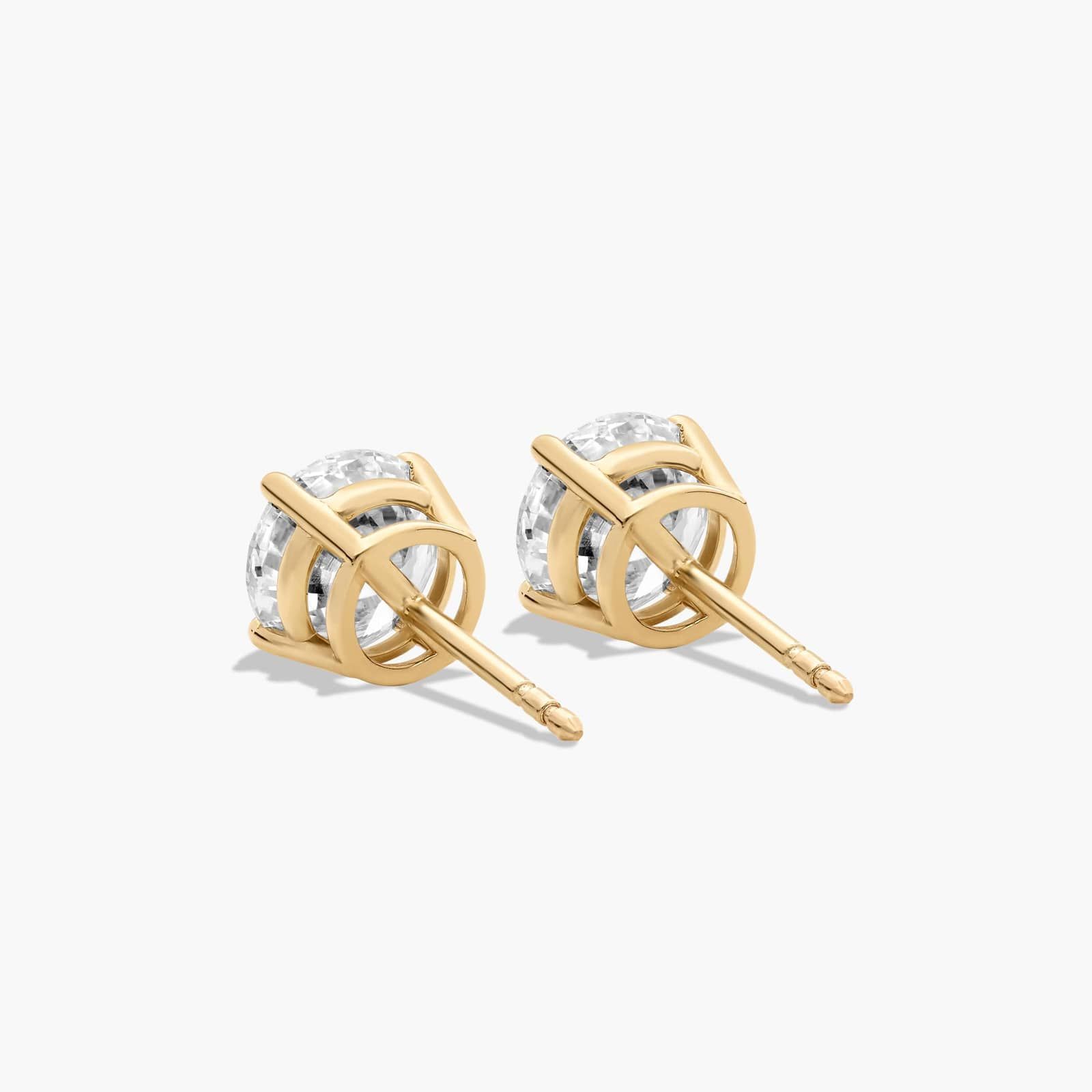 Four Prong 2.5 CTW Round Diamond Stud Earrings In 14K Yellow Gold