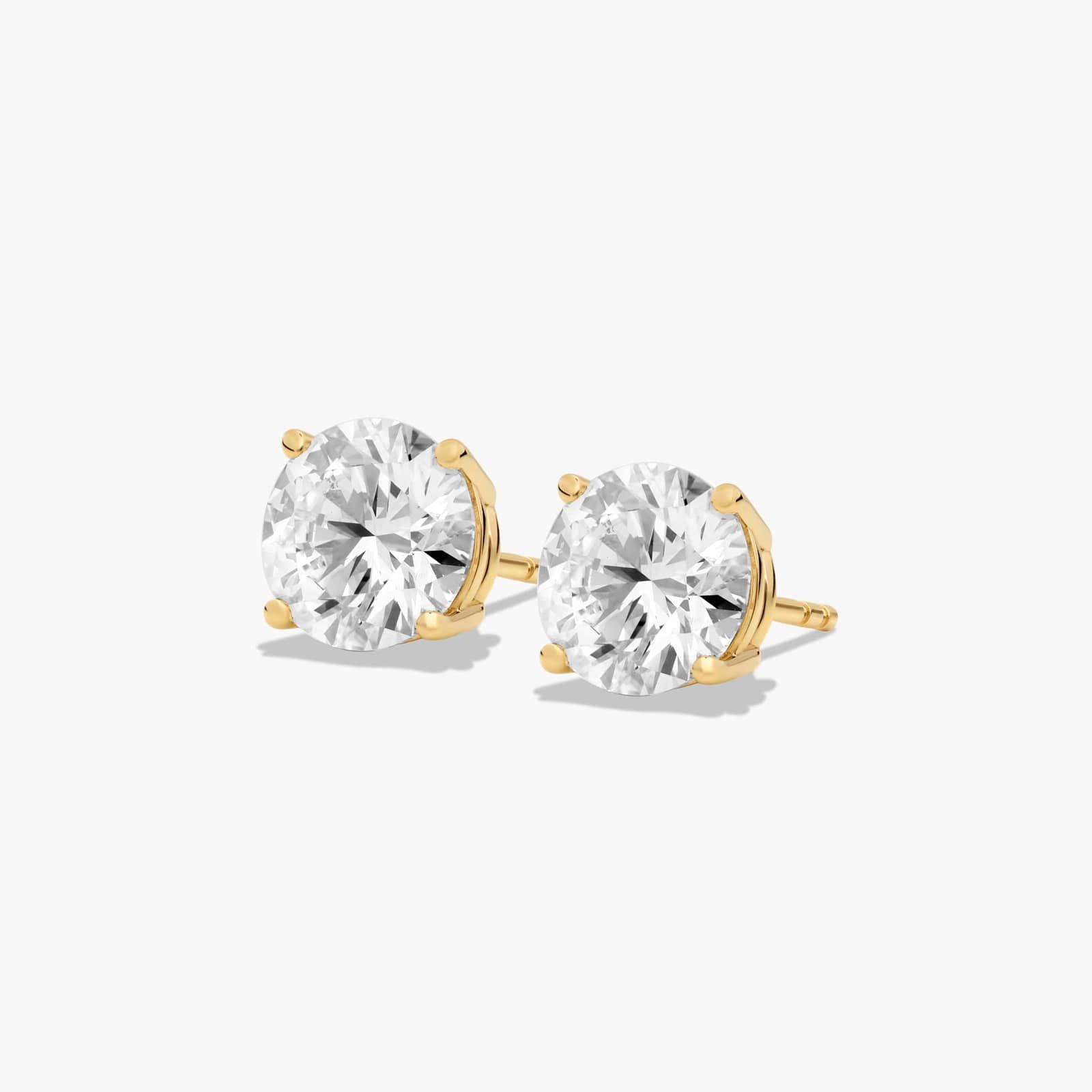 Four Prong 3 CTW Round Diamond Stud Earrings In 14K Yellow Gold