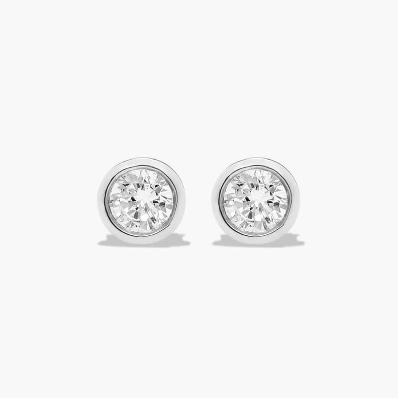Bezel 0.25 CTW Diamond Stud Earrings In Platinum
