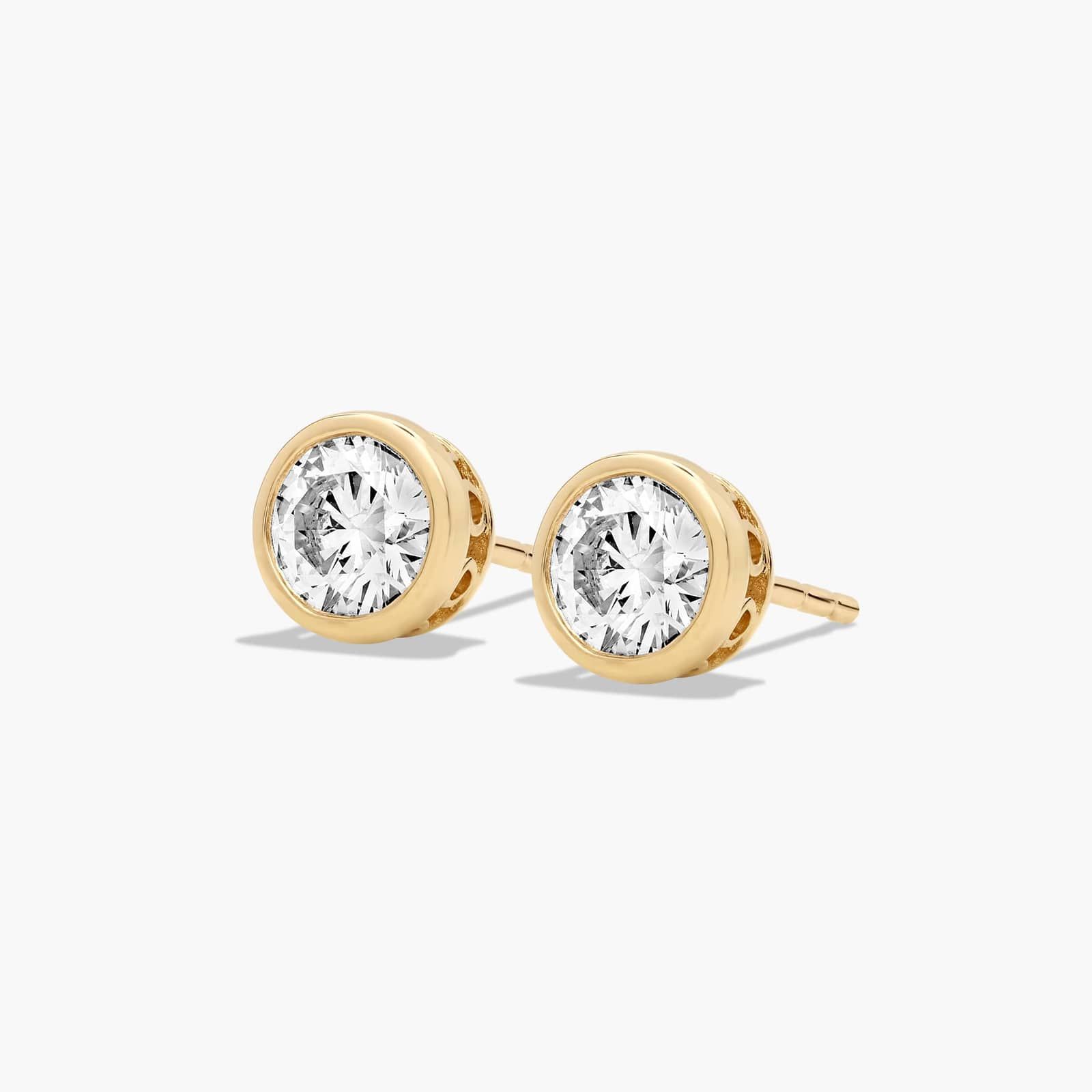 Bezel 0.75 CTW Diamond Stud Earrings In 14K Yellow Gold