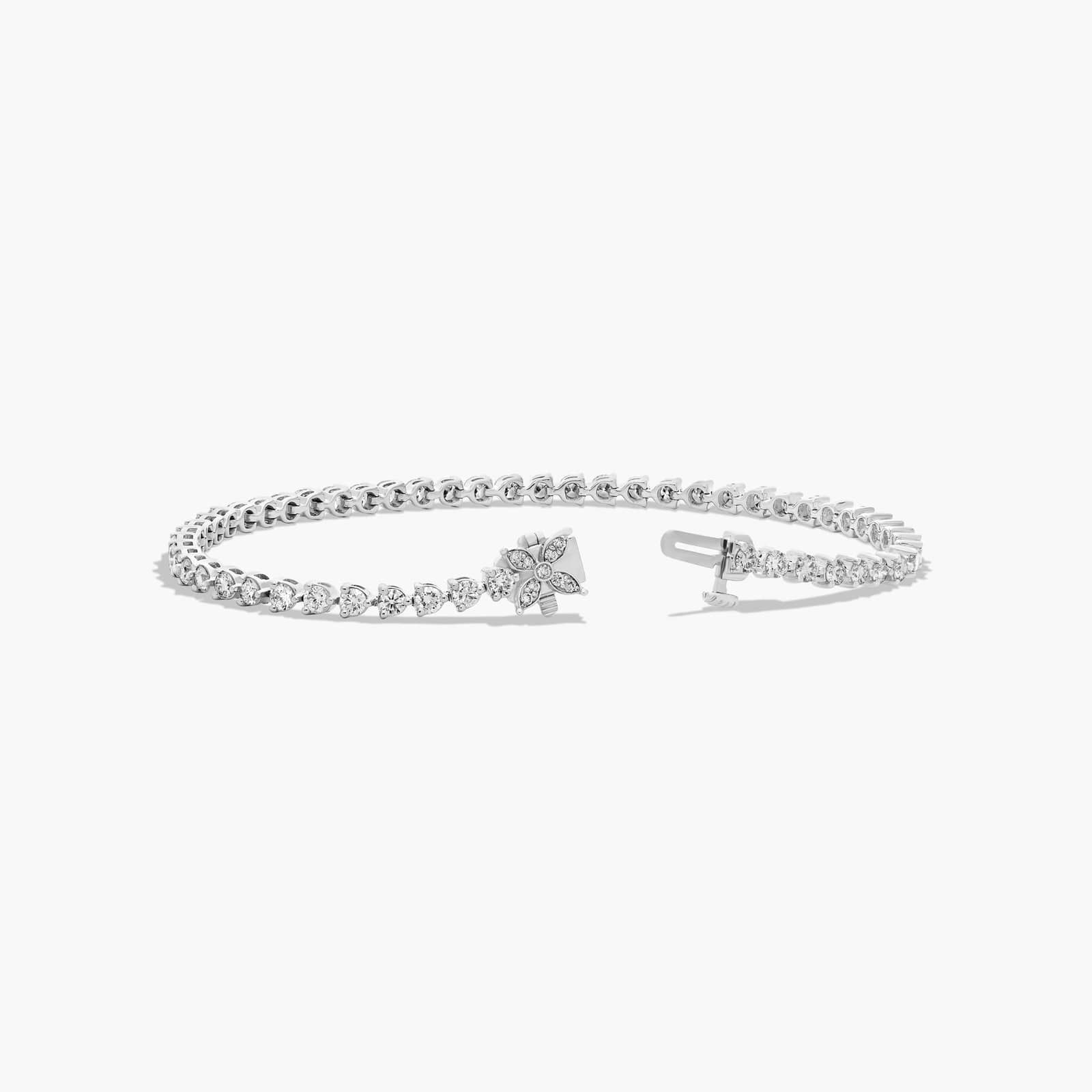 Flower Clasp Tennis Bracelet With 3 CTW Diamonds In Platinum