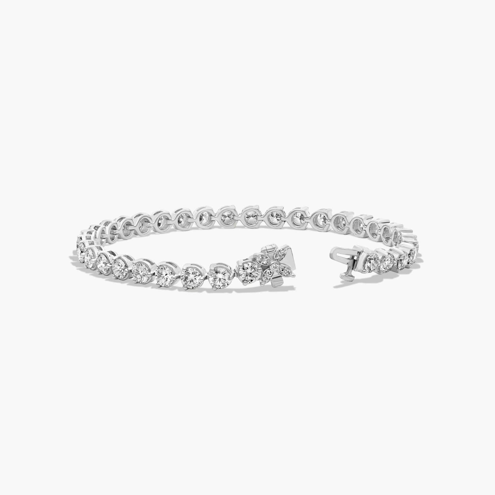 Flower Clasp Tennis Bracelet With 8 CTW Diamonds In Platinum