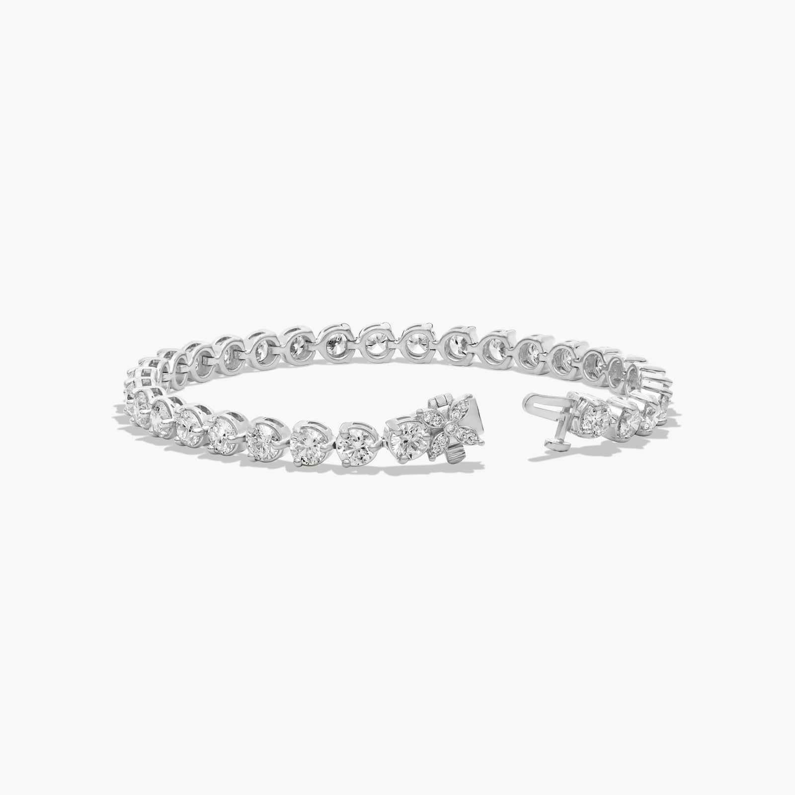 Flower Clasp Tennis Bracelet With 10 CTW Diamonds In Platinum