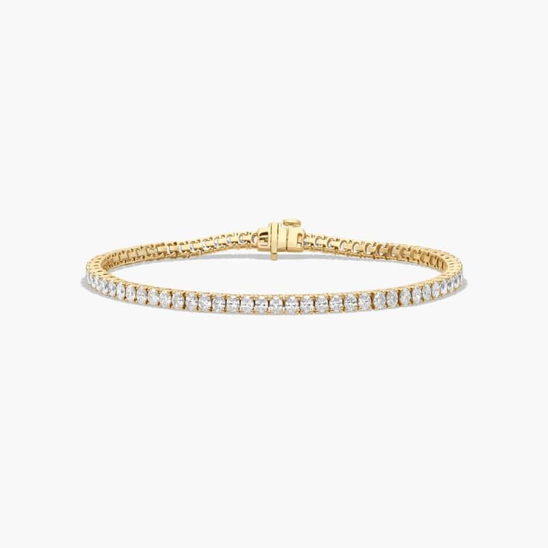 Tennis Bracelet With 5 CTW Oval Cut Lab-Grown Diamonds In 14K Yellow Gold
