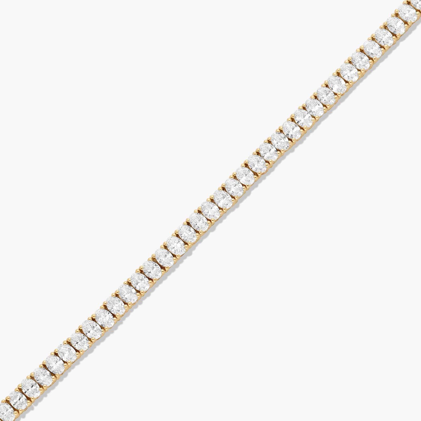 Tennis Bracelet With 5 CTW Oval Cut Lab-Grown Diamonds In 14K Yellow Gold