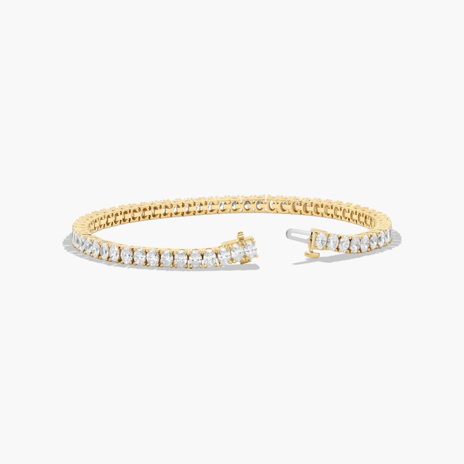 Tennis Bracelet With 8 CTW Oval Cut Lab-Grown Diamonds In 14K Yellow Gold