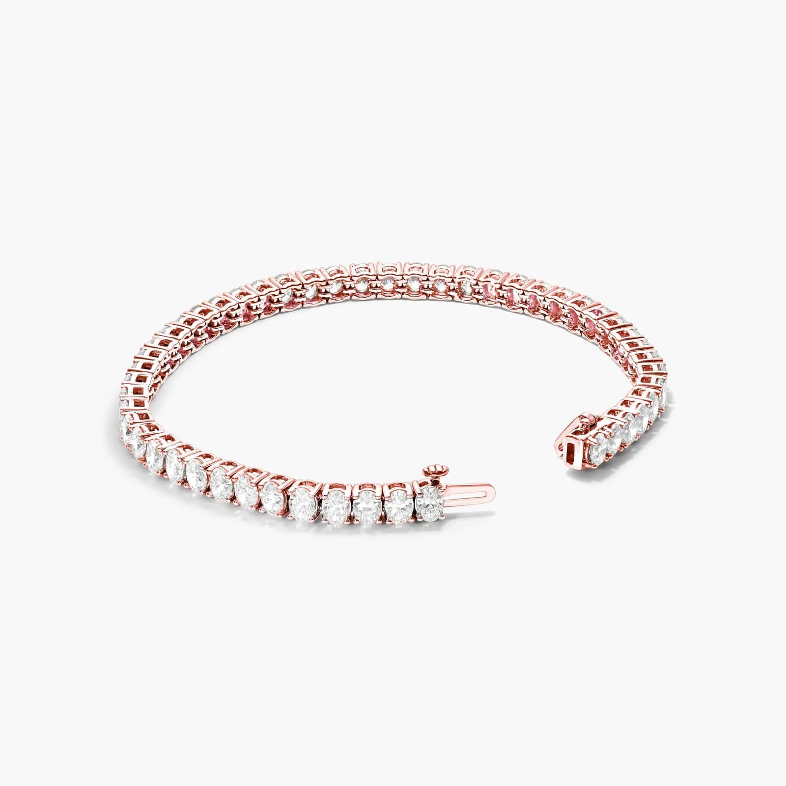 Tennis Bracelet With 10 CTW Oval Cut Diamonds In 14K Rose Gold