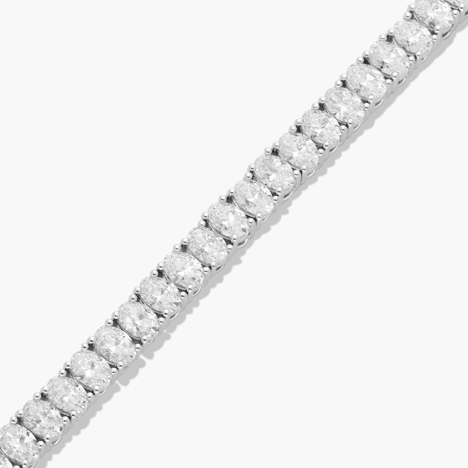 Tennis Bracelet With 10 CTW Oval Cut Lab-Grown Diamonds In 14K White Gold