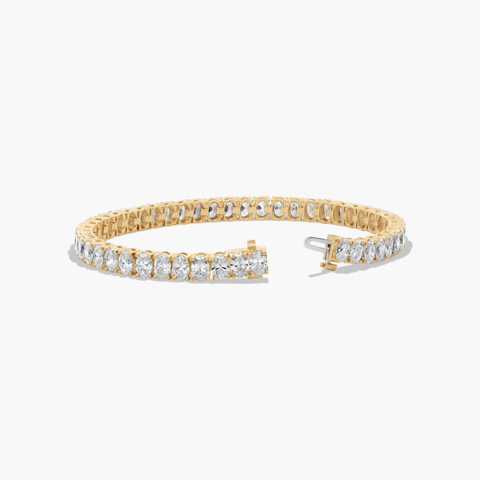 Tennis Bracelet With 12 CTW Oval Cut Lab-Grown Diamonds In 14K Yellow Gold