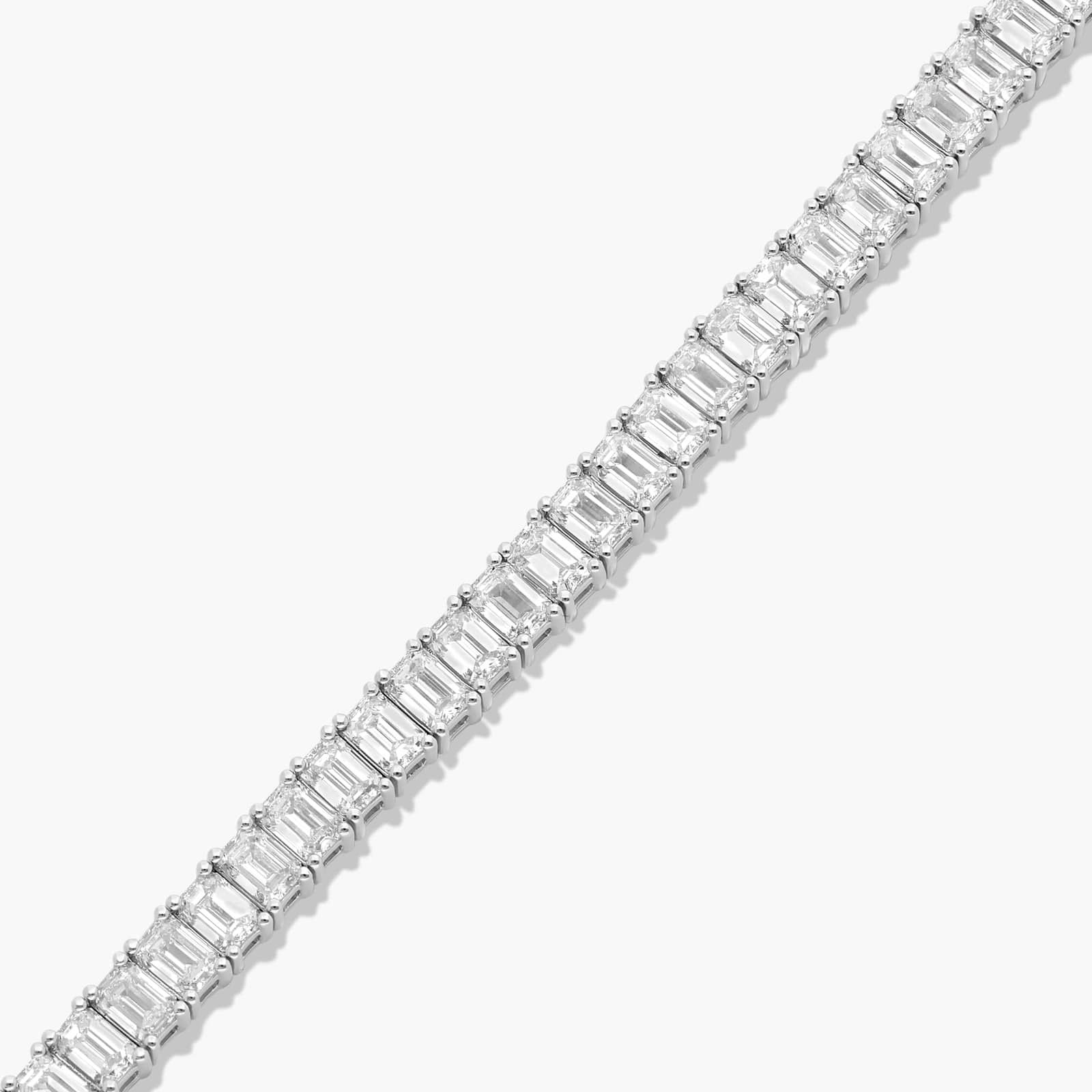 Tennis Bracelet With 10 CTW Emerald Cut Diamonds In 14K White Gold (7")