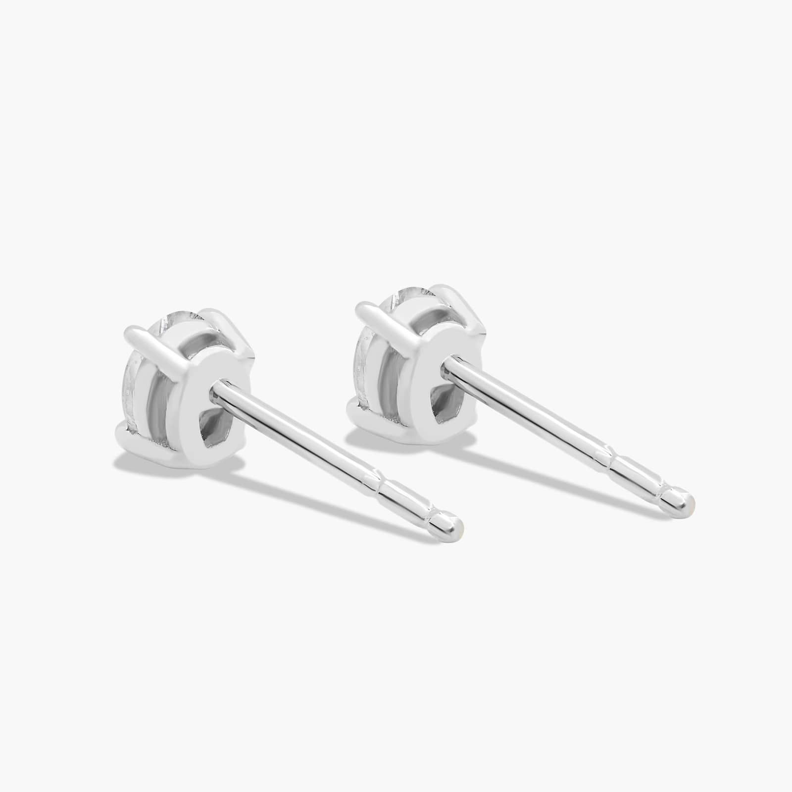 Oval Cut 0.25 CTW Diamond Stud Earrings In Platinum