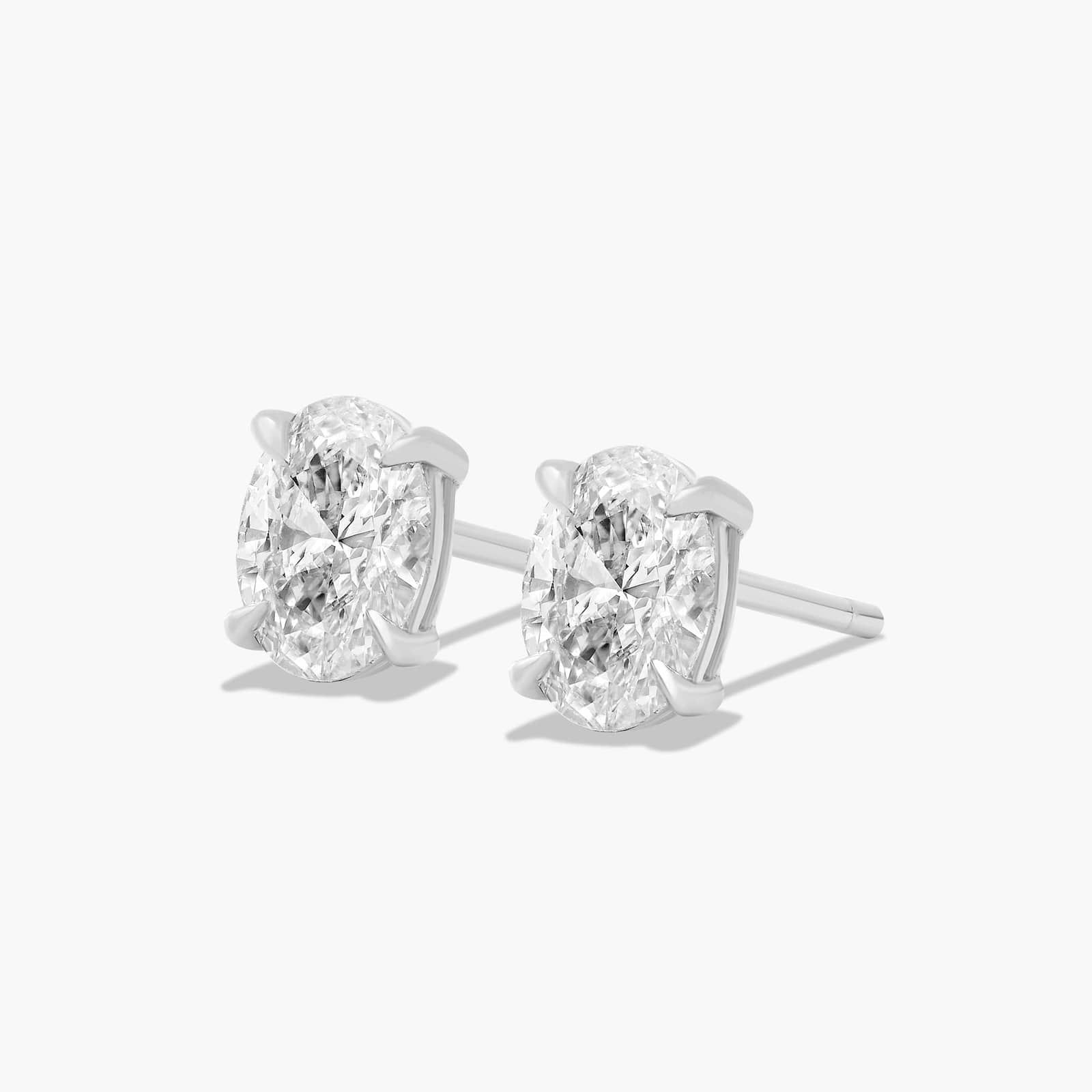 Oval Cut 0.75 CTW Diamond Stud Earrings Diamonds In Platinum