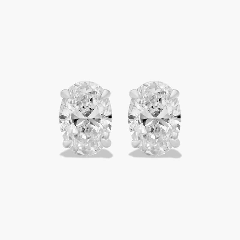 Oval Cut 1 CTW Diamond Stud Earrings In 14K White Gold