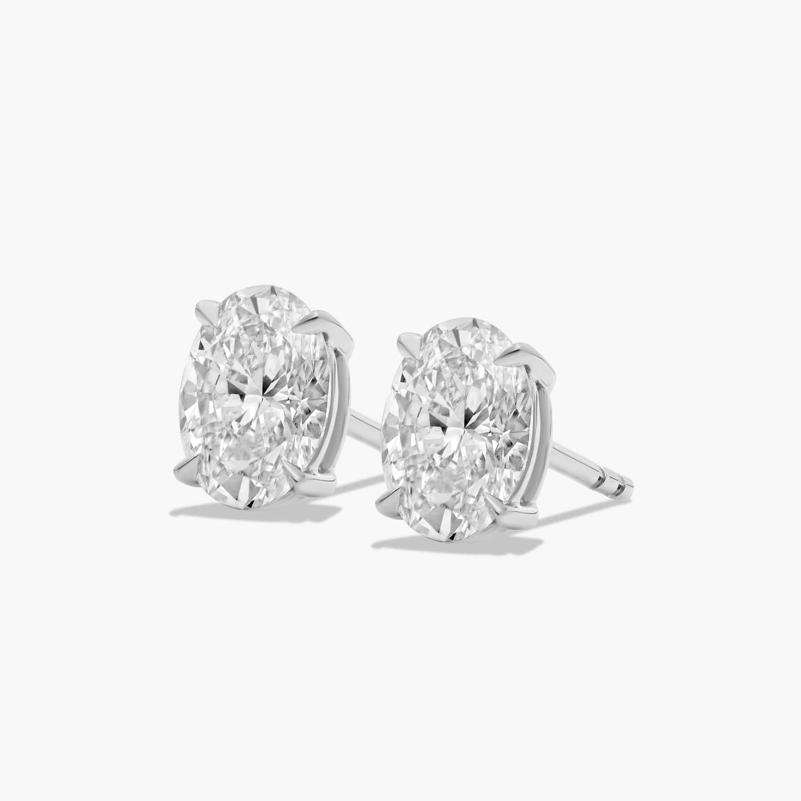 Oval Cut 1.5 CTW Diamond Stud Earrings In Platinum