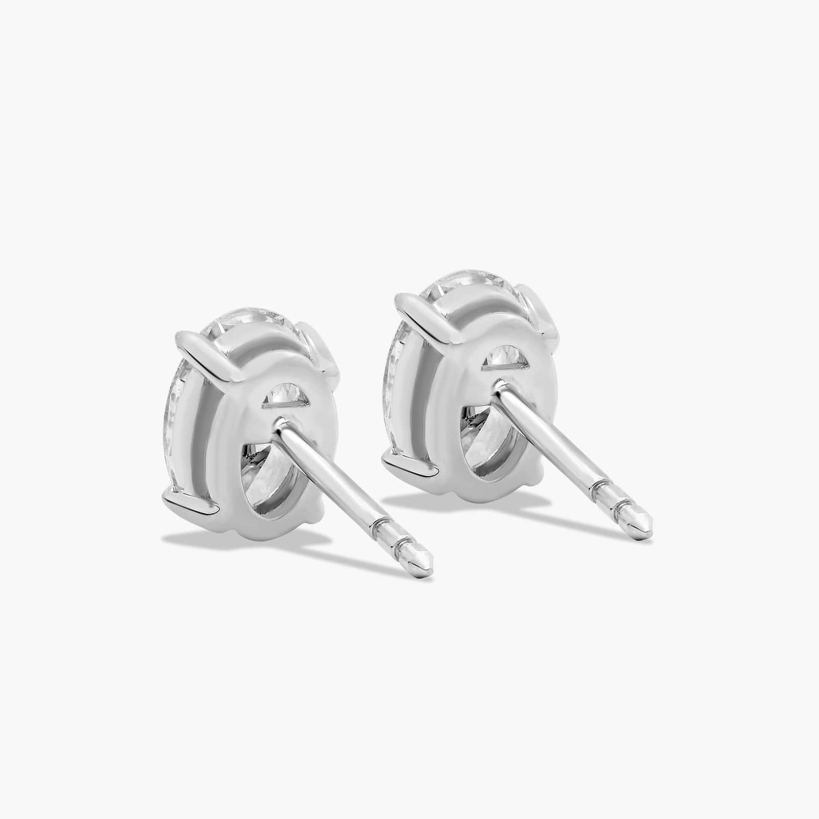 Oval Cut 1.5 CTW Diamond Stud Earrings In Platinum