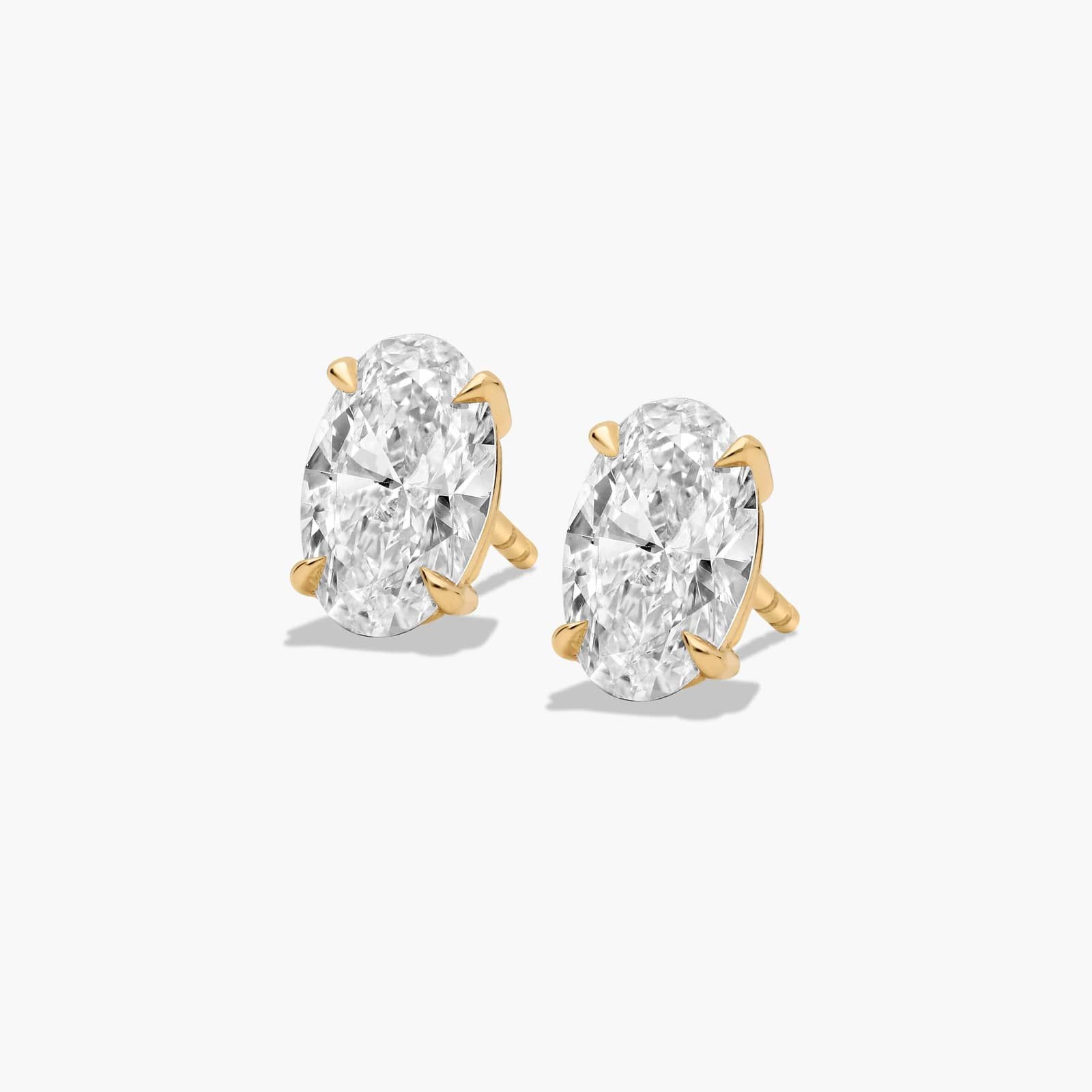 Oval Cut 2 CTW Lab-Grown Diamond Stud Earrings In 14K Yellow Gold
