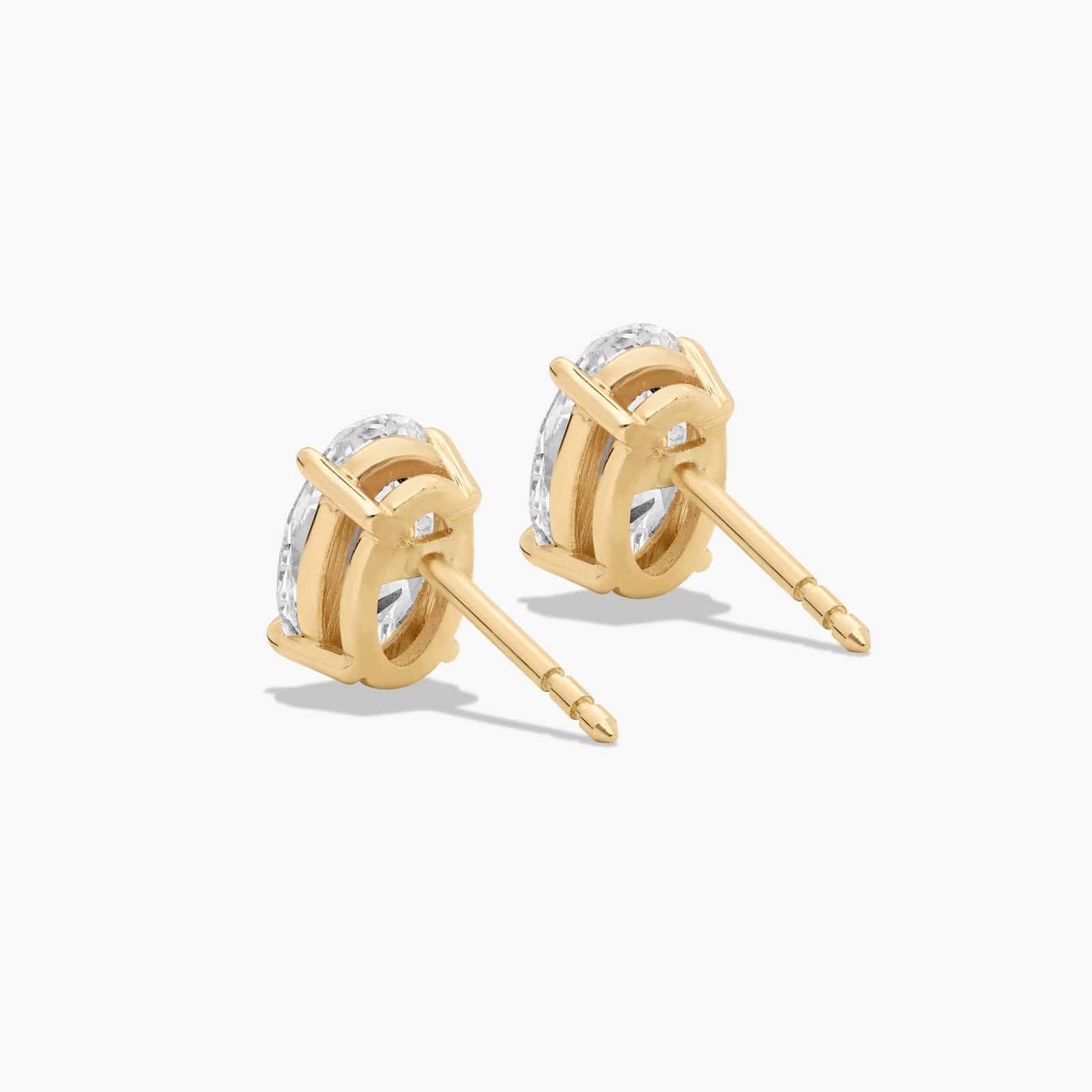 Oval Cut 2 CTW Lab-Grown Diamond Stud Earrings In 14K Yellow Gold