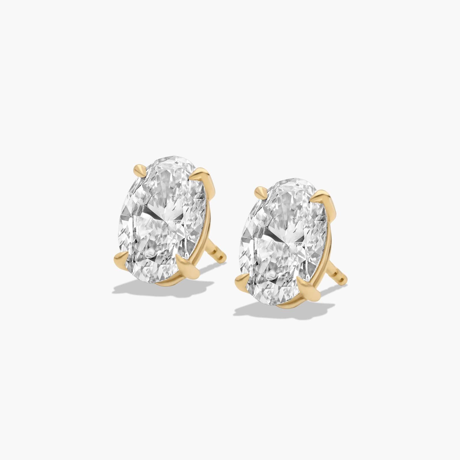 Oval Cut 3 CTW Lab-Grown Diamond Stud Earrings In 14K Yellow Gold