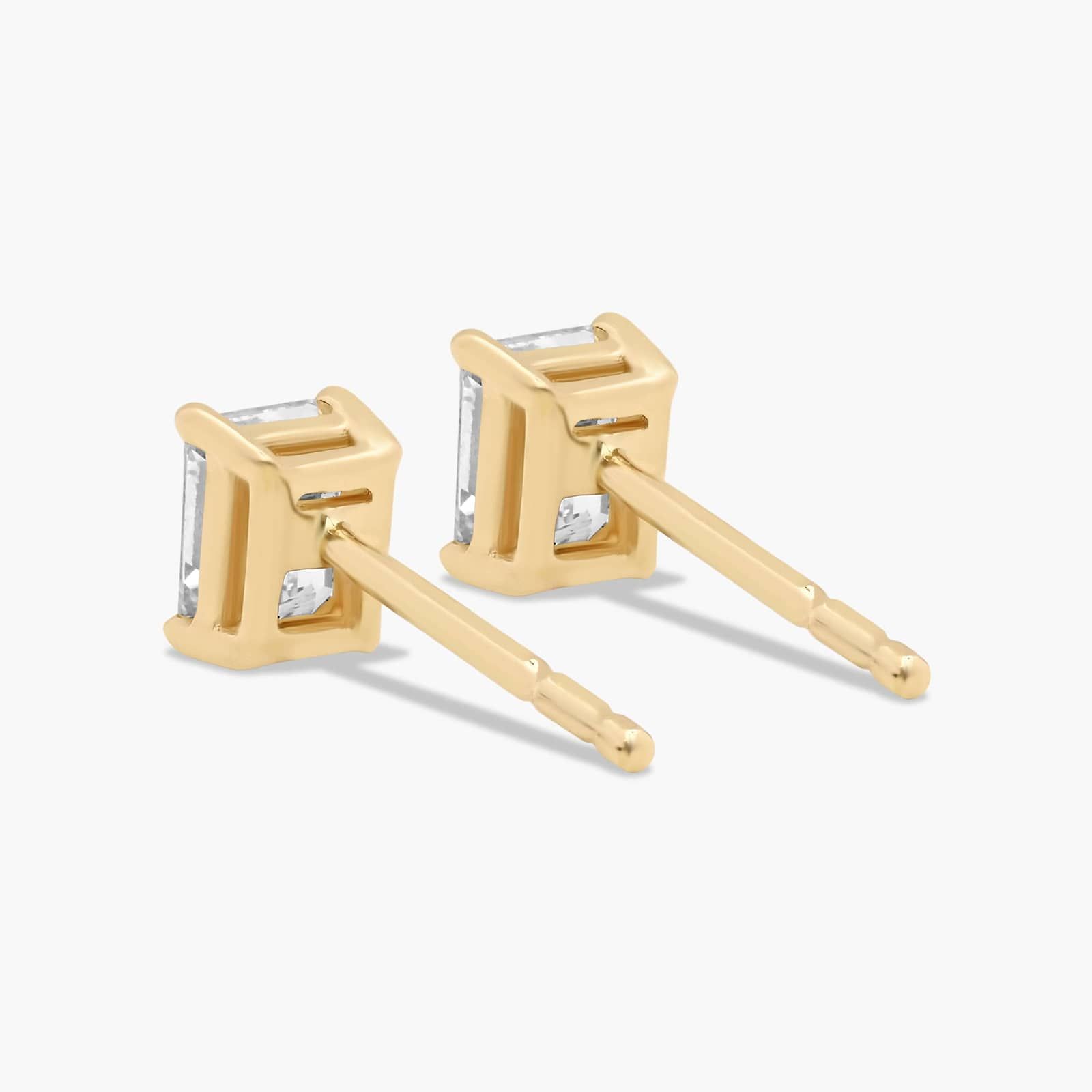 Emerald Cut 0.5 CTW Diamond Stud Earrings In 14K Yellow Gold