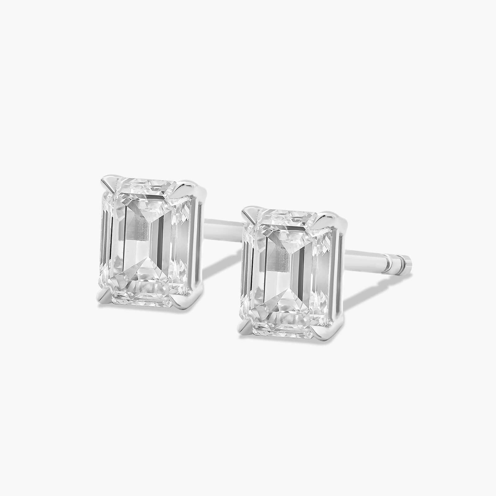 Emerald Cut 0.75 CTW Diamond Stud Earrings In Platinum
