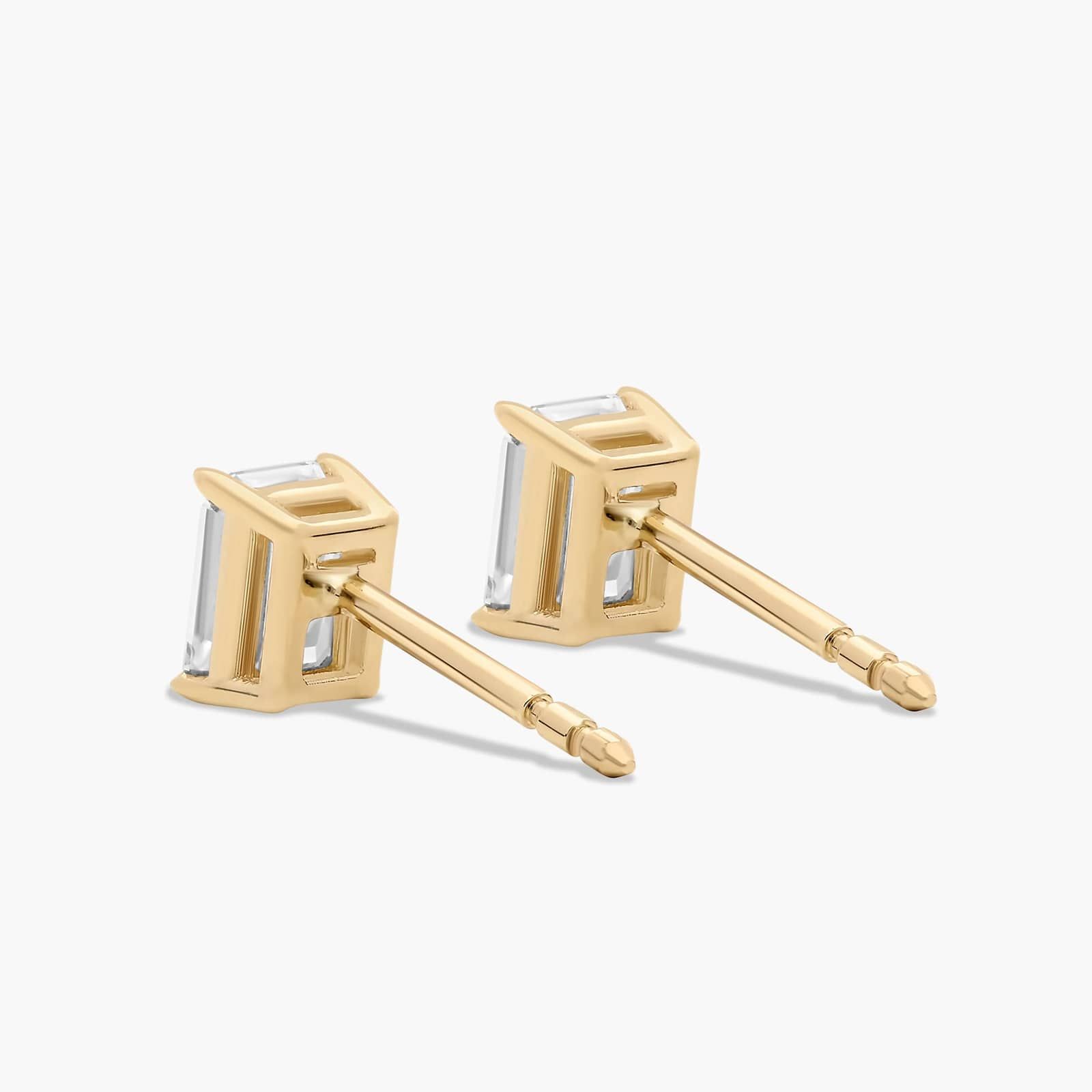 Emerald Cut 0.75 CTW Diamond Stud Earrings In 14K Yellow Gold