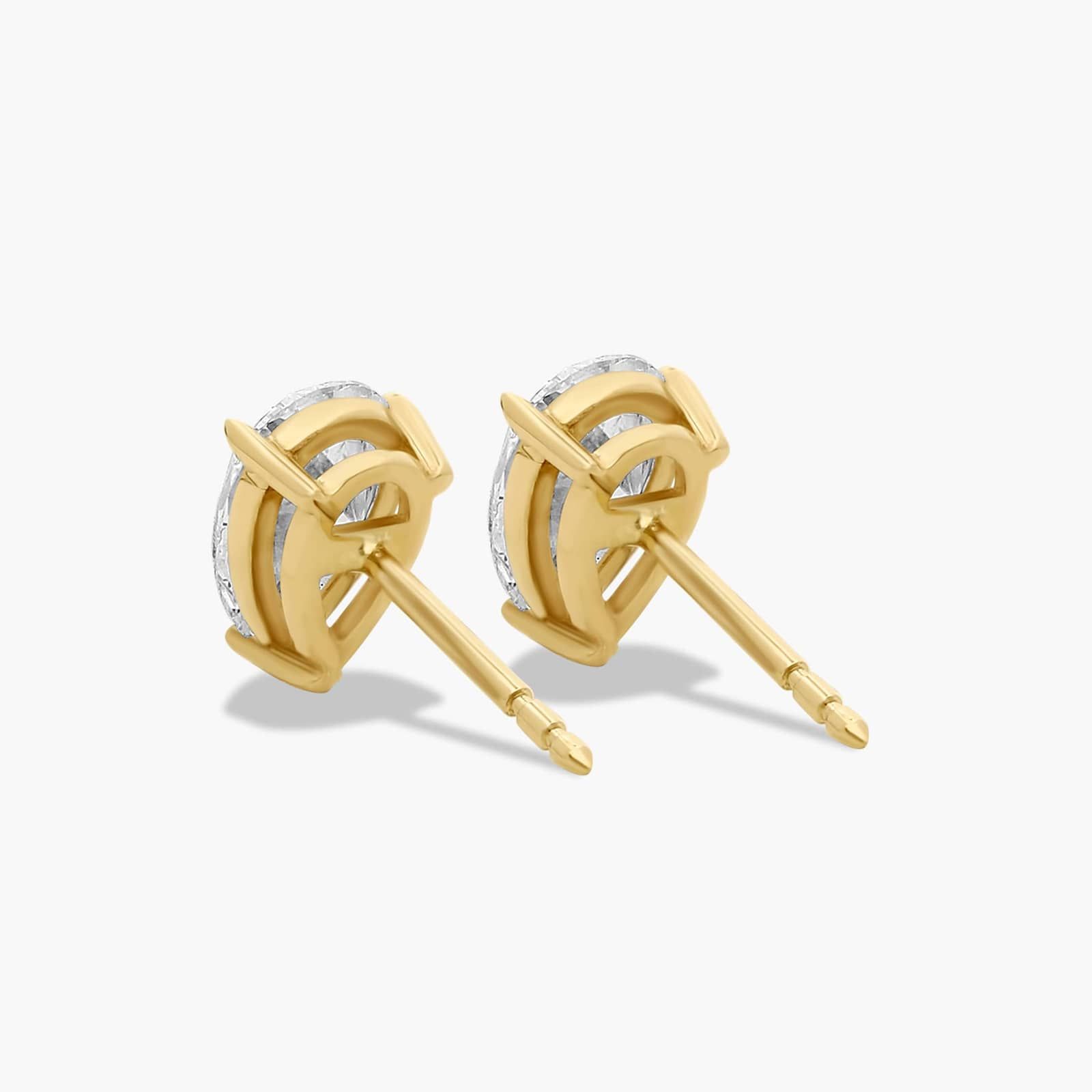 Pear Shape 1.5 CTW Diamond Stud Earrings In 14K Yellow Gold