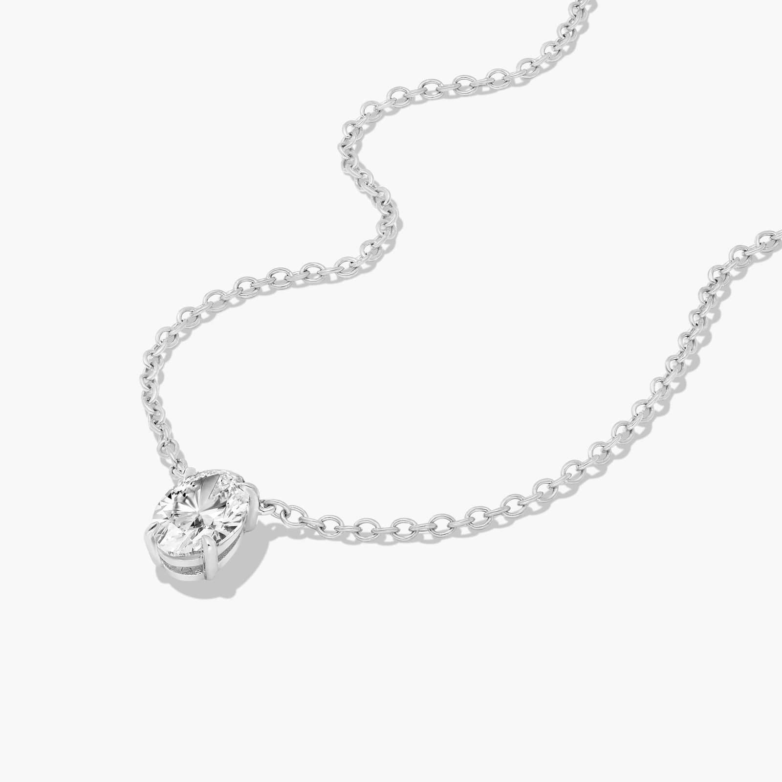 Platinum Oval Shape Diamond Solitaire Pendant (0.50 CTW - H-I / SI1-SI2)