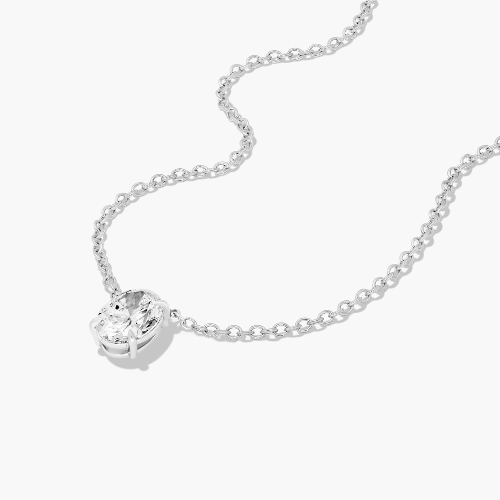 Platinum Oval Shape Diamond Solitaire Pendant (0.75 CTW - H-I / SI1-SI2)
