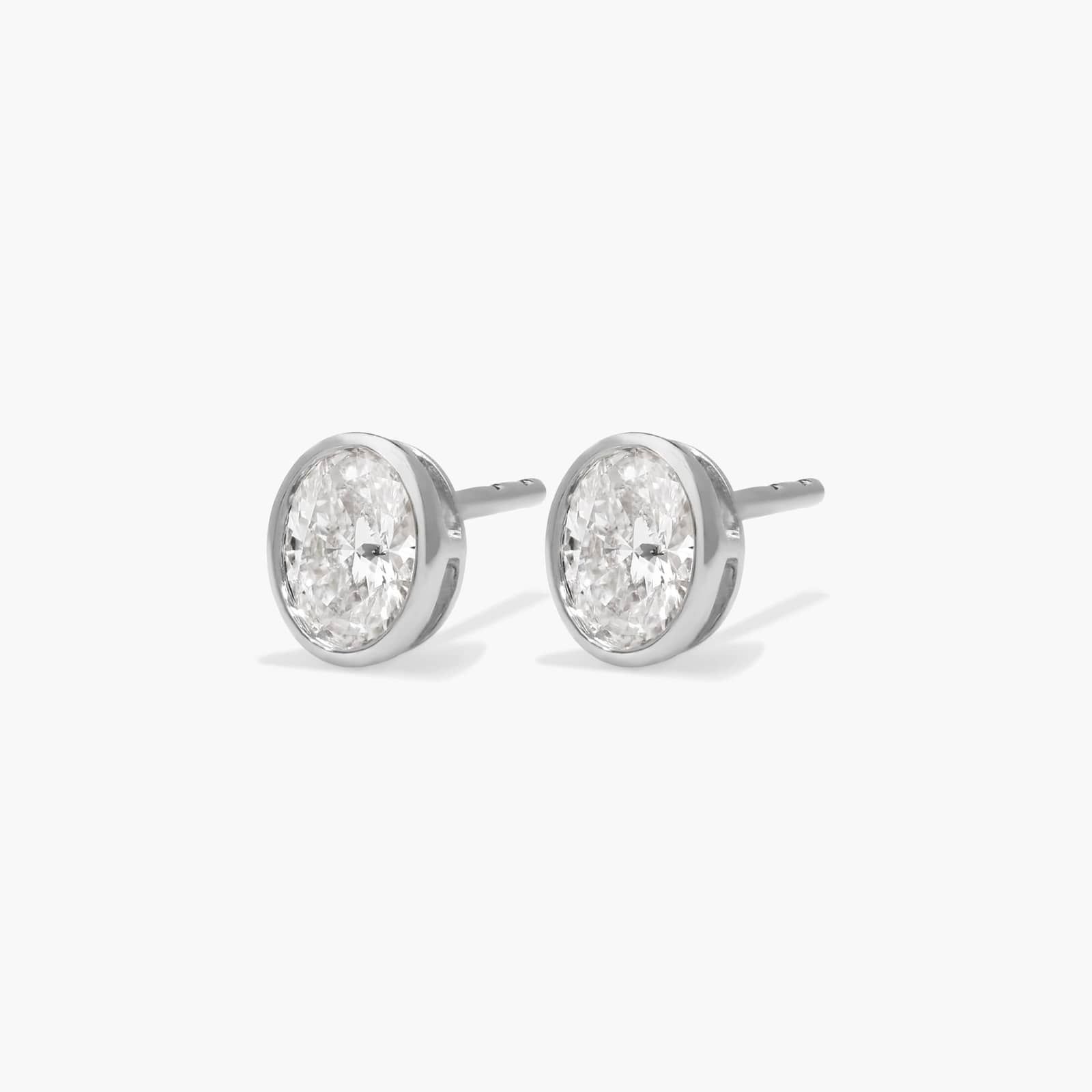 Bezel Stud Earrings With 0.5 CTW Oval Cut Lab-Grown Diamonds in 14K White Gold
