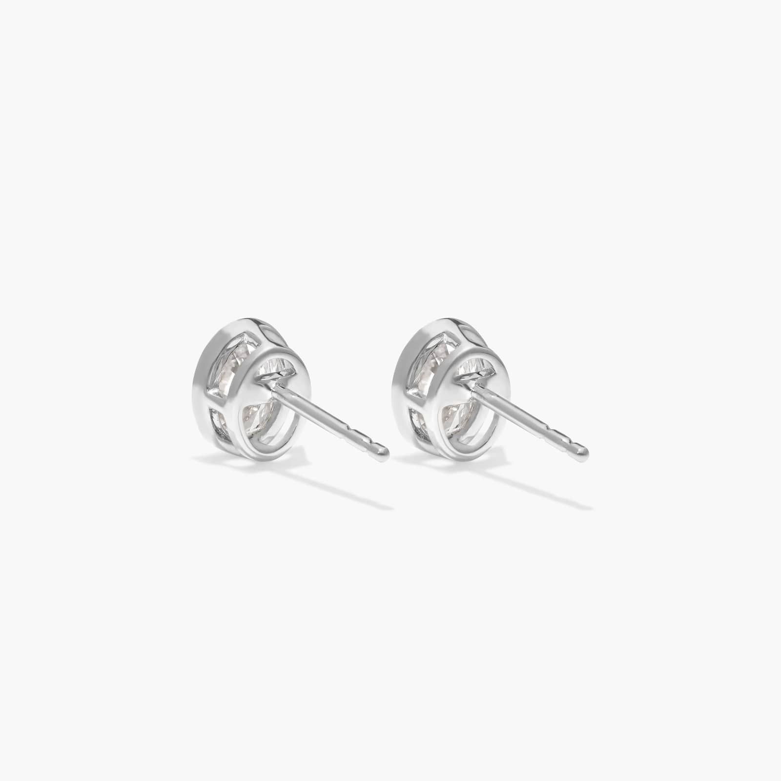 Bezel Stud Earrings With 0.75 CTW Oval Cut Lab-Grown Diamonds in 14K White Gold