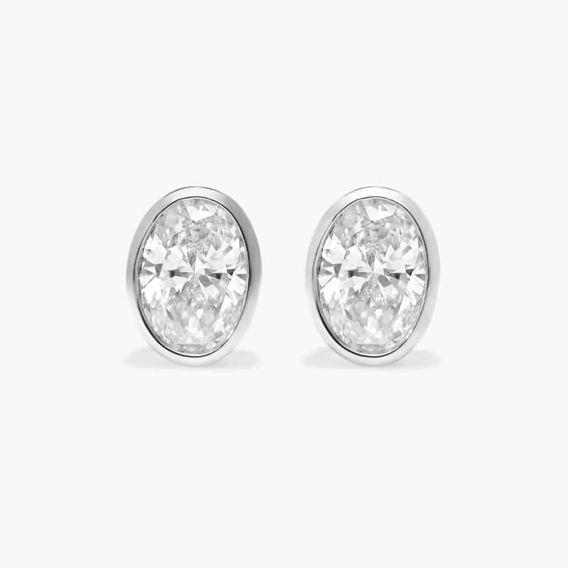 Bezel Diamond Stud Earrings With 1 CTW Oval Cut Diamonds in 14K White Gold