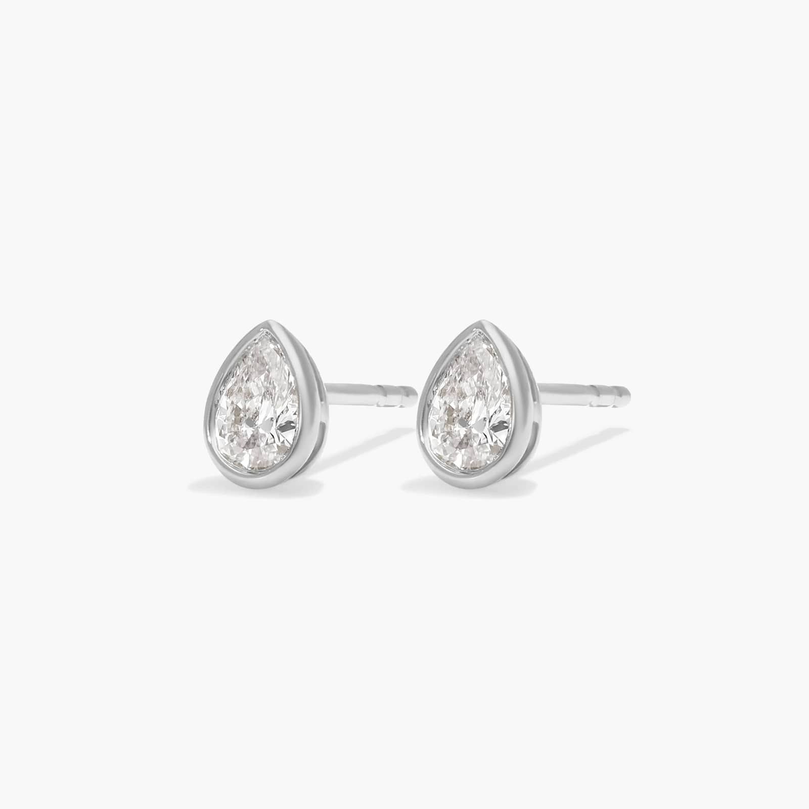 Bezel Diamond Stud Earrings With 0.25 CTW Pear Shaped Diamonds in 14K White Gold