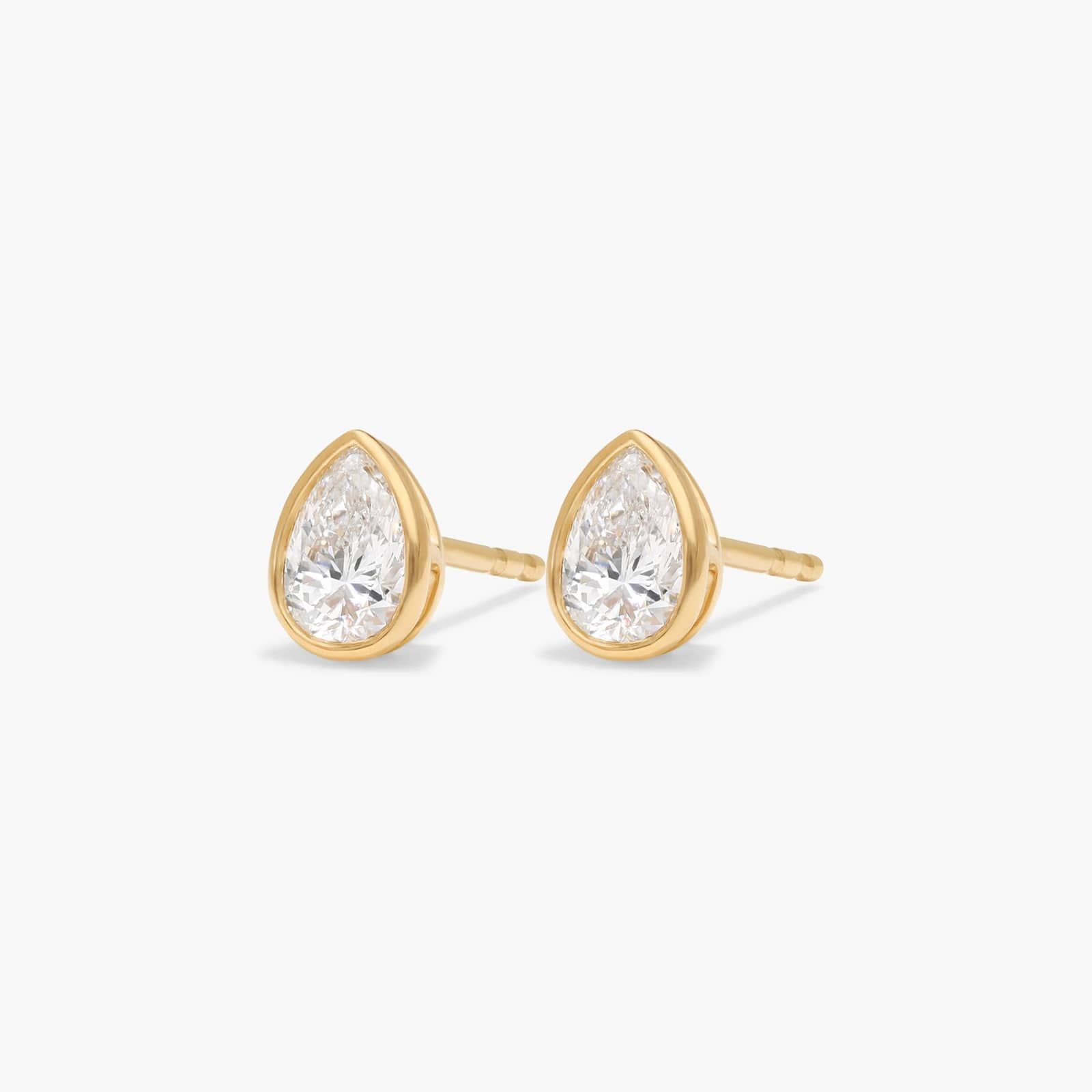 Bezel Diamond Stud Earrings With 0.5 CTW Pear Shaped Diamonds in 14K Yellow Gold