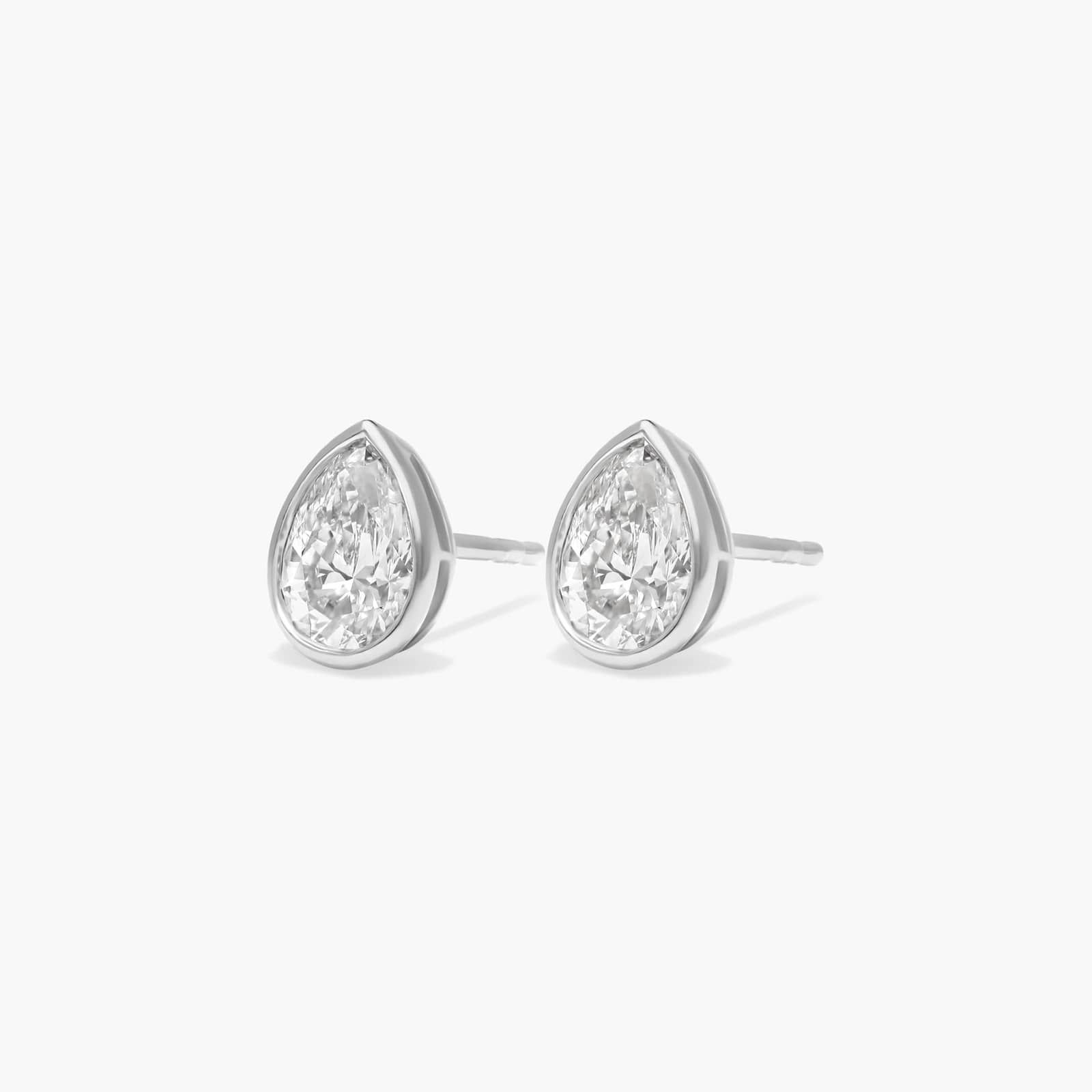 Bezel Diamond Stud Earrings With 0.75 CTW Pear Shaped Diamonds in 14K White Gold