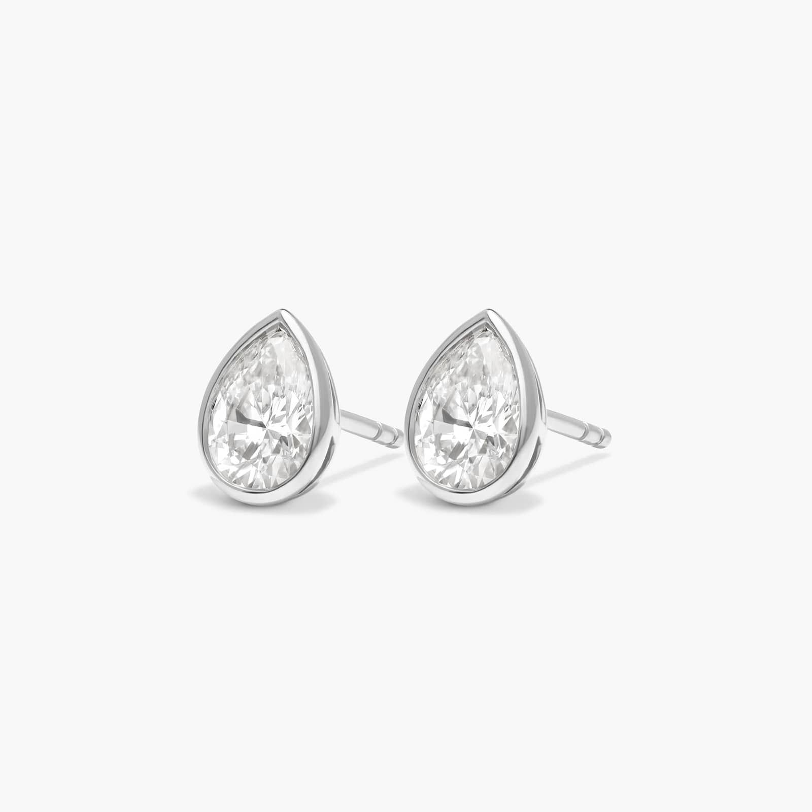 Bezel Diamond Stud Earrings With 1 CTW Pear Shaped Diamonds in 14K White Gold