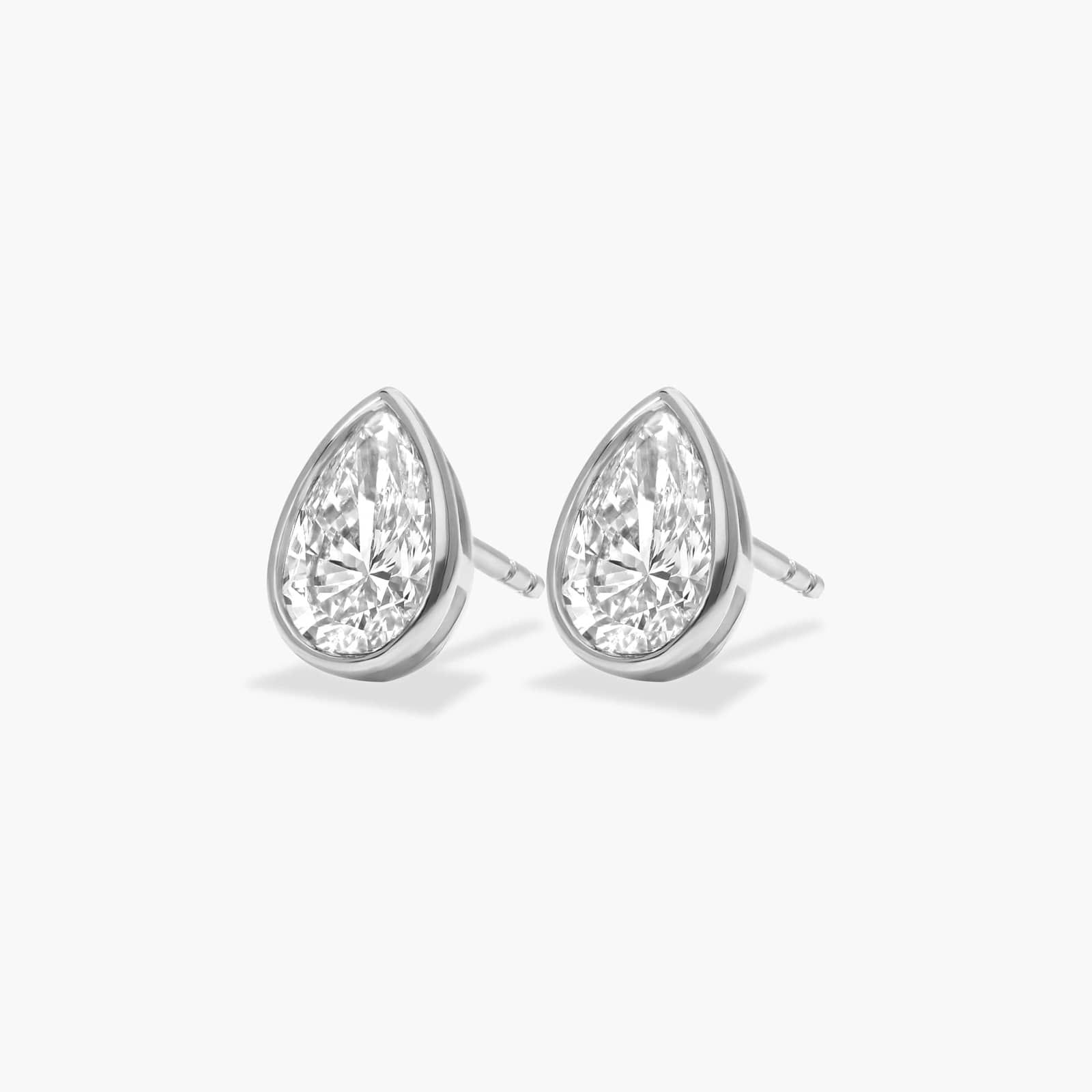 Bezel Diamond Stud Earrings With 1.5 CTW Pear Shaped Diamonds in 14K White Gold