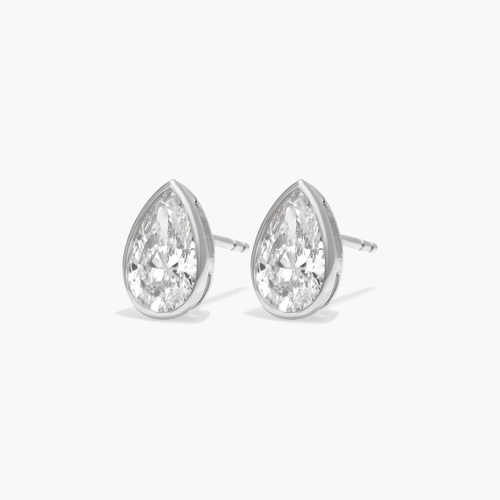 Bezel Diamond Stud Earrings With 2 CTW Pear Shaped Diamonds in 14K White Gold