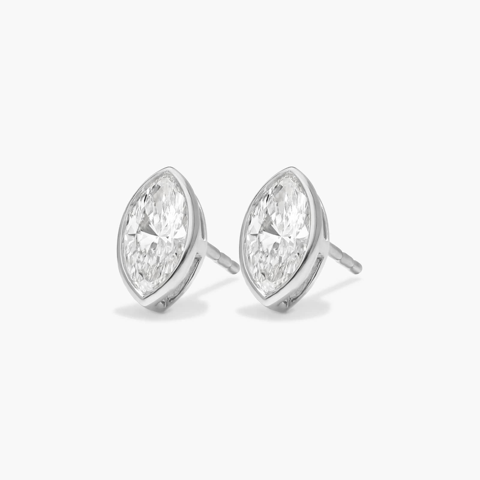 Bezel Diamond Stud Earrings With 0.75 CTW Marquise Cut Diamonds in 14K White Gold