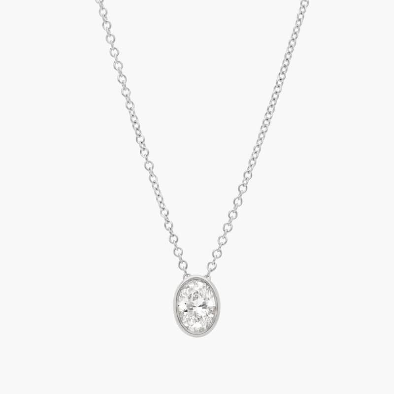 Bezel Solitaire Pendant Necklace With 0.5 CTW Oval Cut Diamond in Platinum