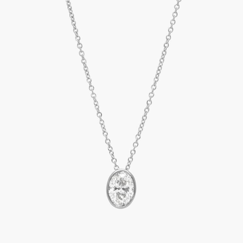 Bezel Solitaire Pendant Necklace With 1 CTW Oval Cut Diamond in Platinum