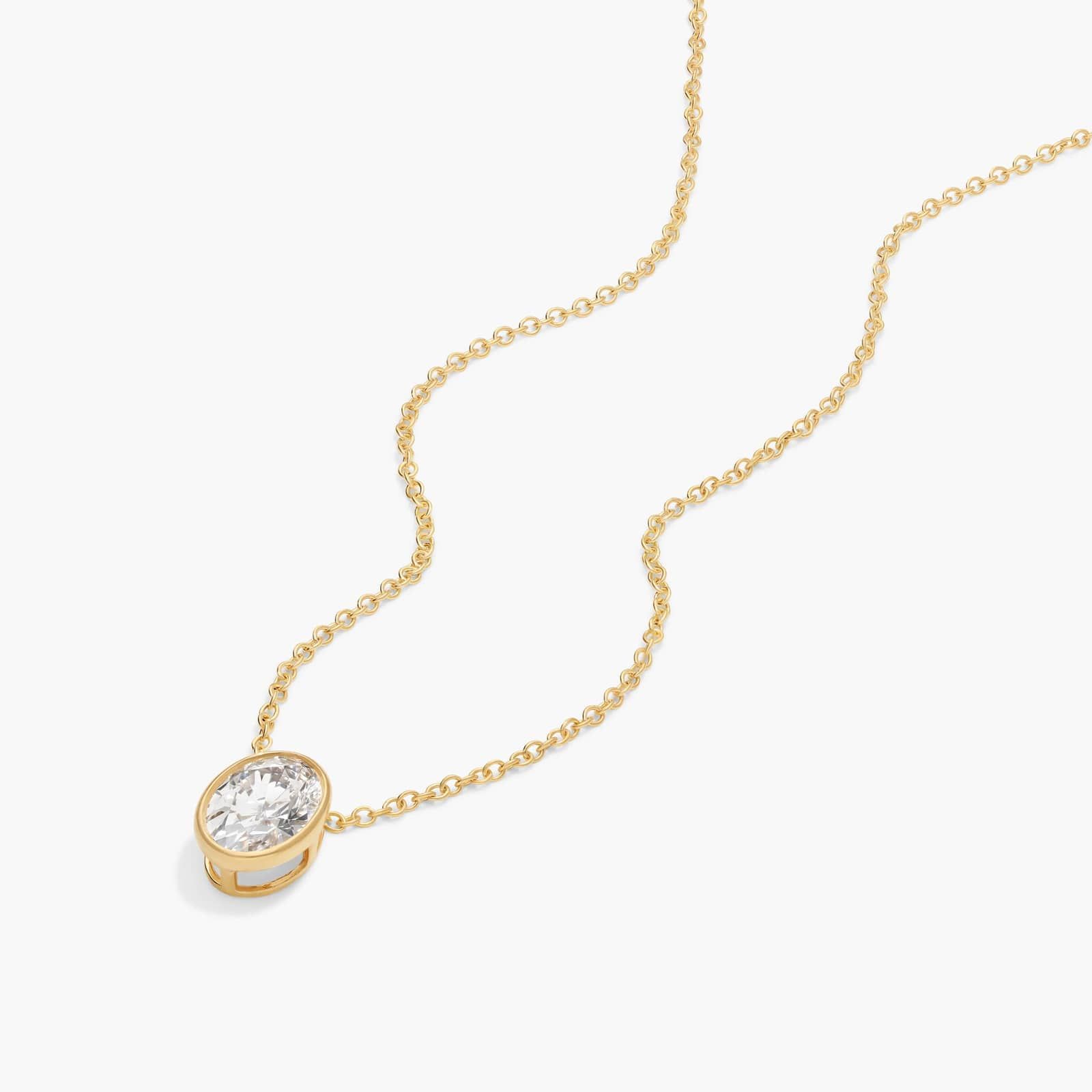 Bezel Solitaire Pendant Necklace With 1 CTW Oval Cut Diamond in 14K Yellow Gold