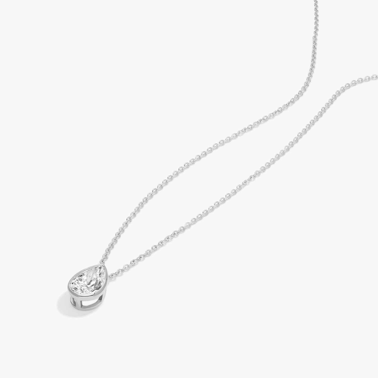 Bezel Solitaire Pendant Necklace With 1 CTW Pear Shaped Diamond in Platinum