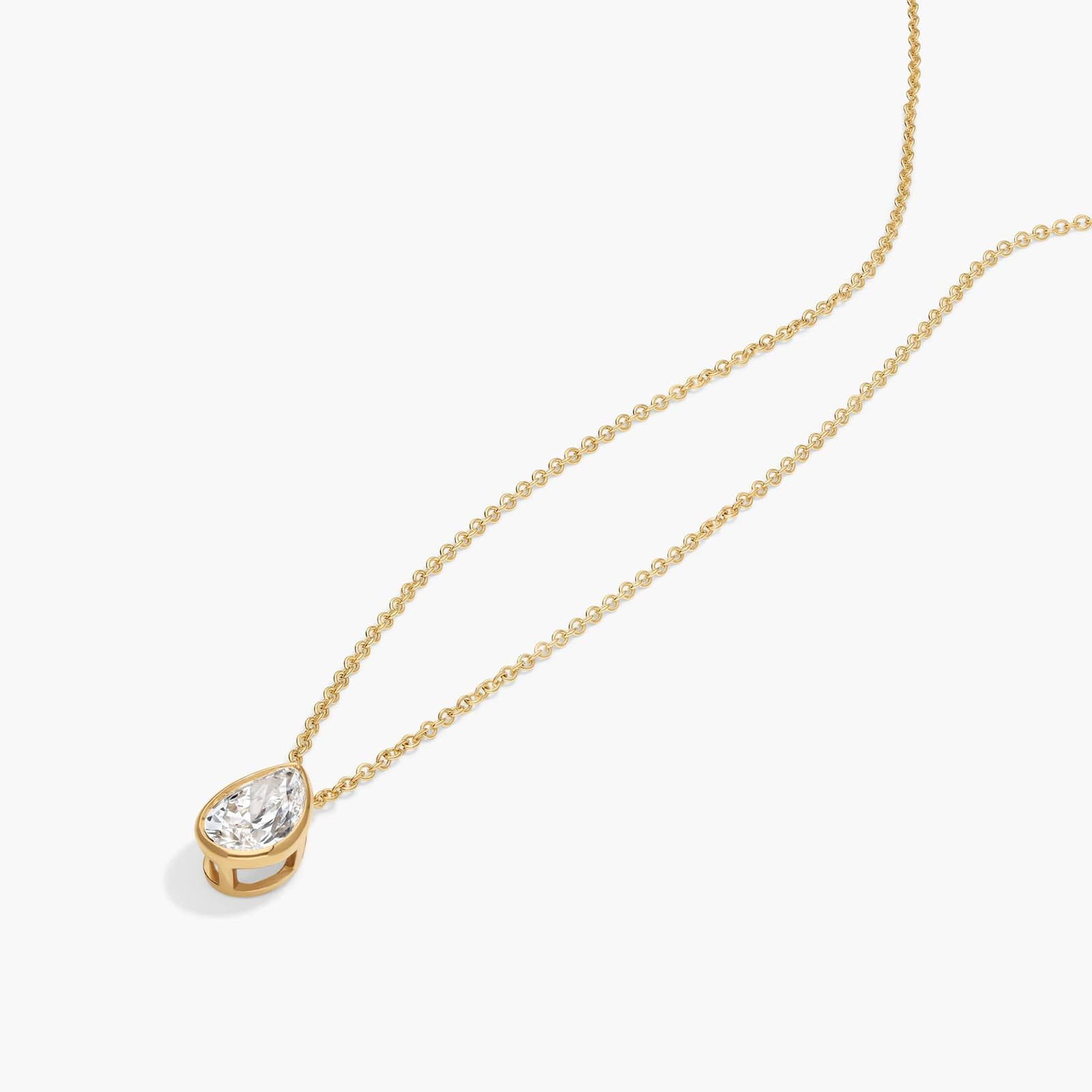 Bezel Solitaire Pendant Necklace With 1 CTW Pear Shaped Diamond in 14K Yellow Gold