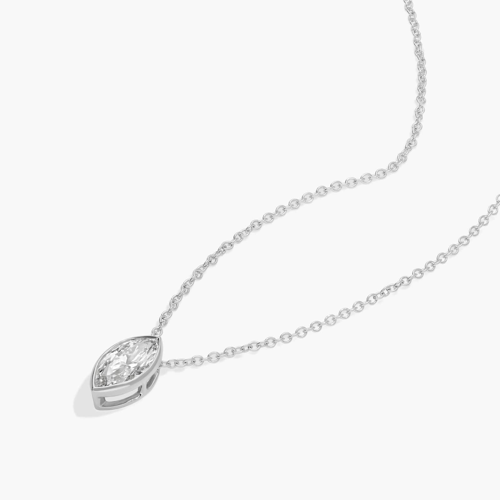 Bezel Solitaire Pendant Necklace With 0.75 CTW Marquise Cut Diamonds in Platinum