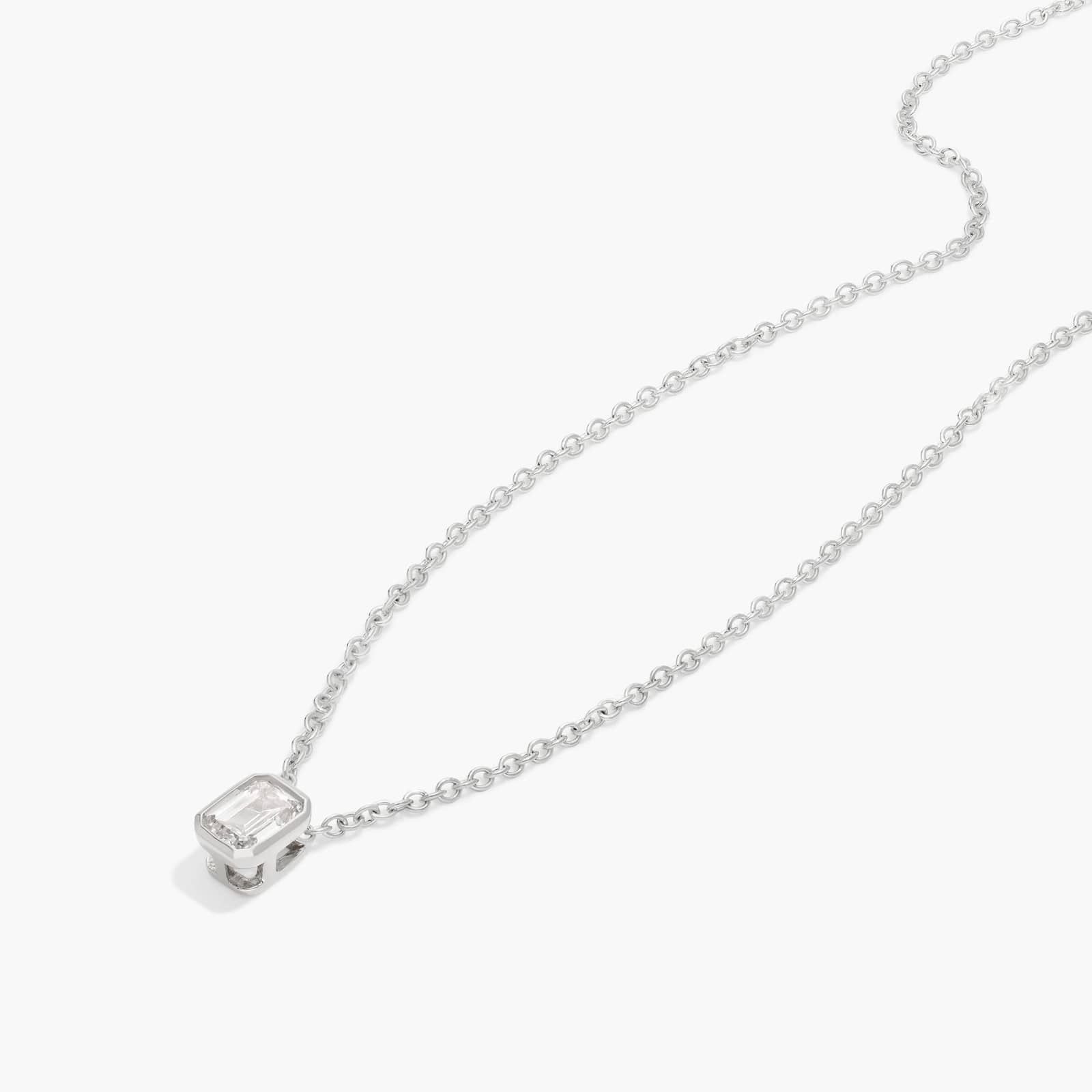 Bezel Solitaire Pendant Necklace With 0.25 CTW Emerald Cut Diamond in Platinum