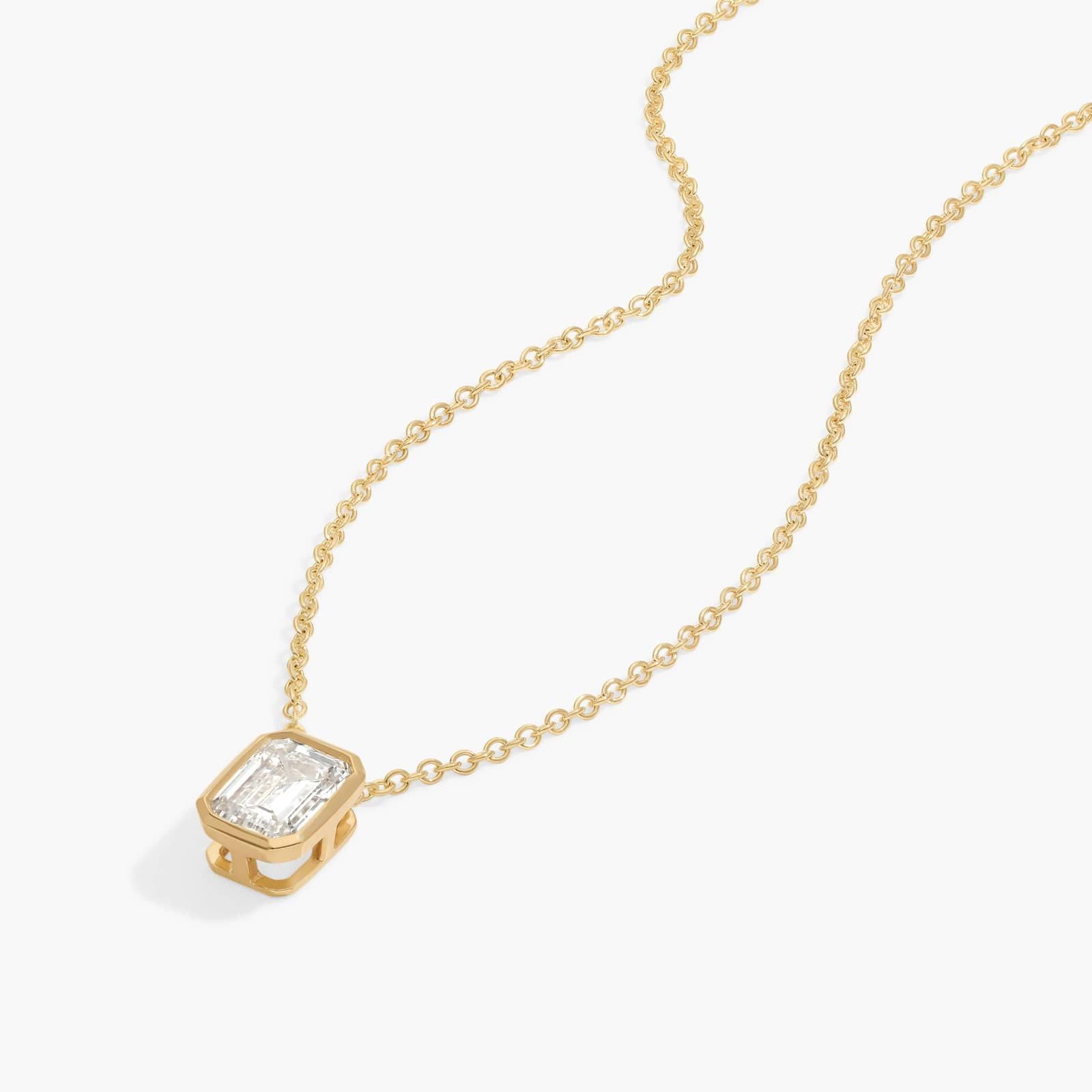 Bezel Solitaire Pendant Necklace With 0.75 CTW Emerald Cut Lab-Grown Diamond in 14K Yellow Gold