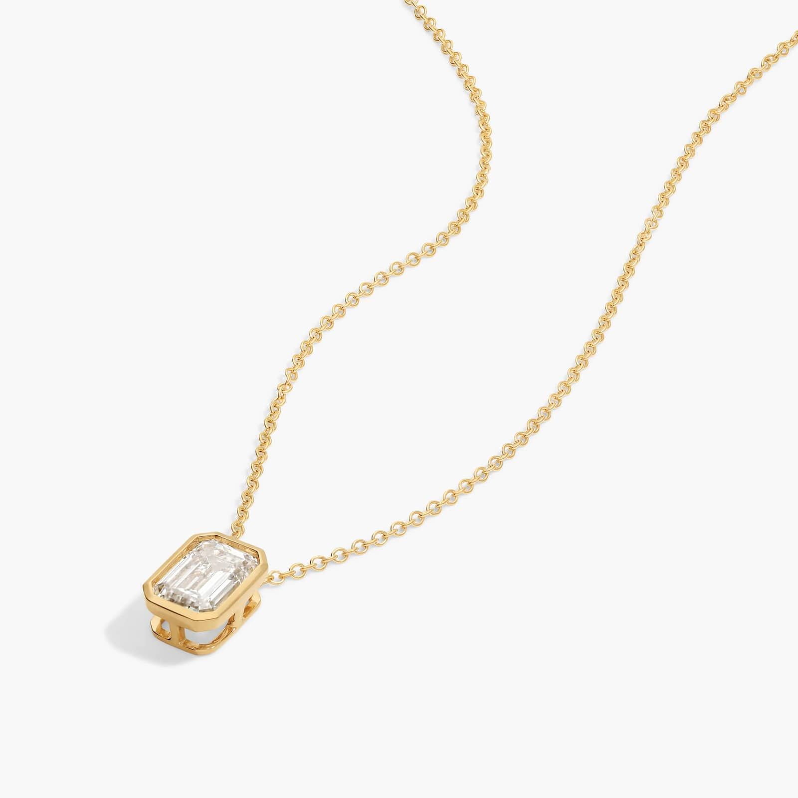 Bezel Solitaire Pendant Necklace With 1.5 CTW Emerald Cut Lab-Grown Diamond in 14K Yellow Gold