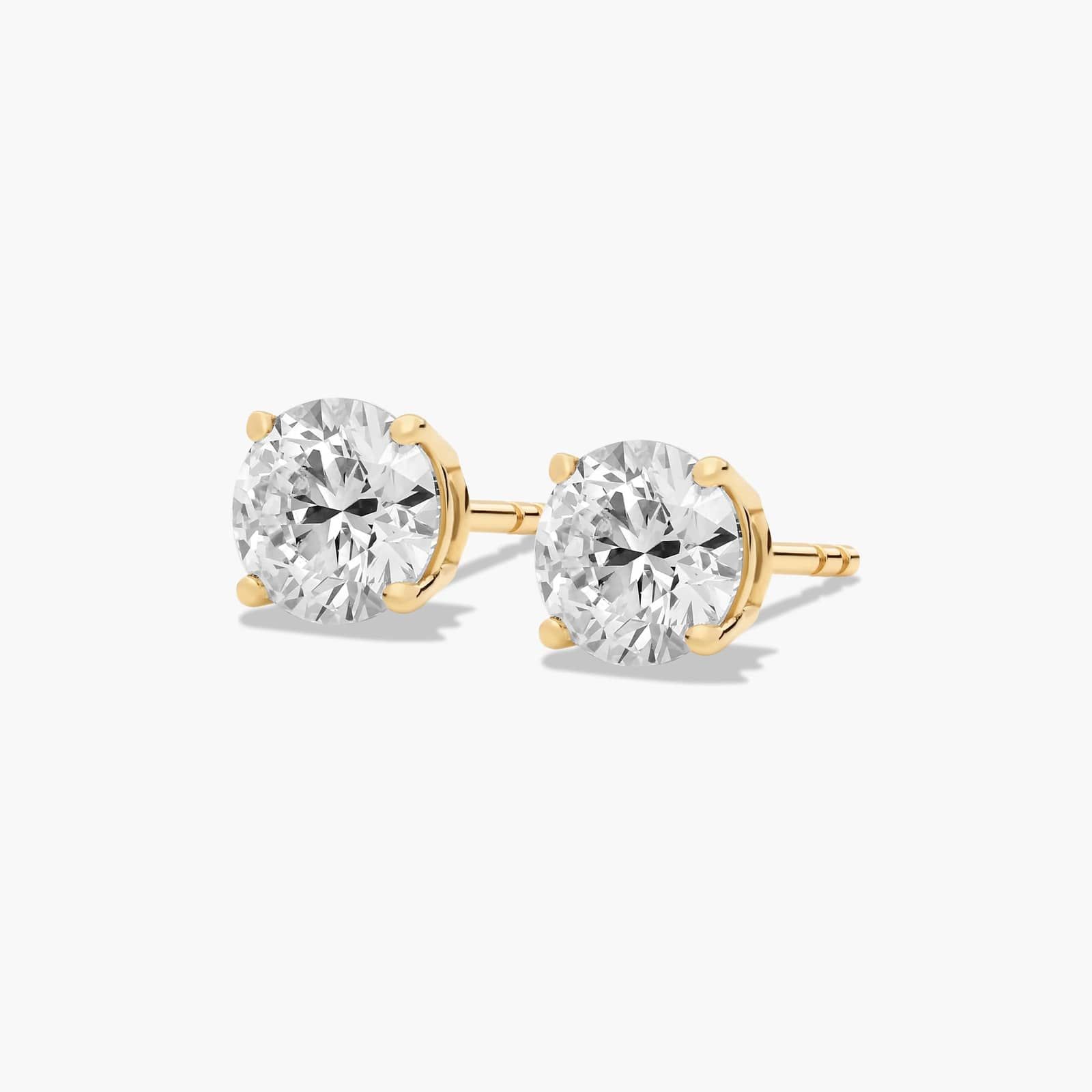 14K Yellow Gold Four Prong Round Brilliant Diamond Stud Earrings (1.50 CTW - F-G / VS1-VS2)