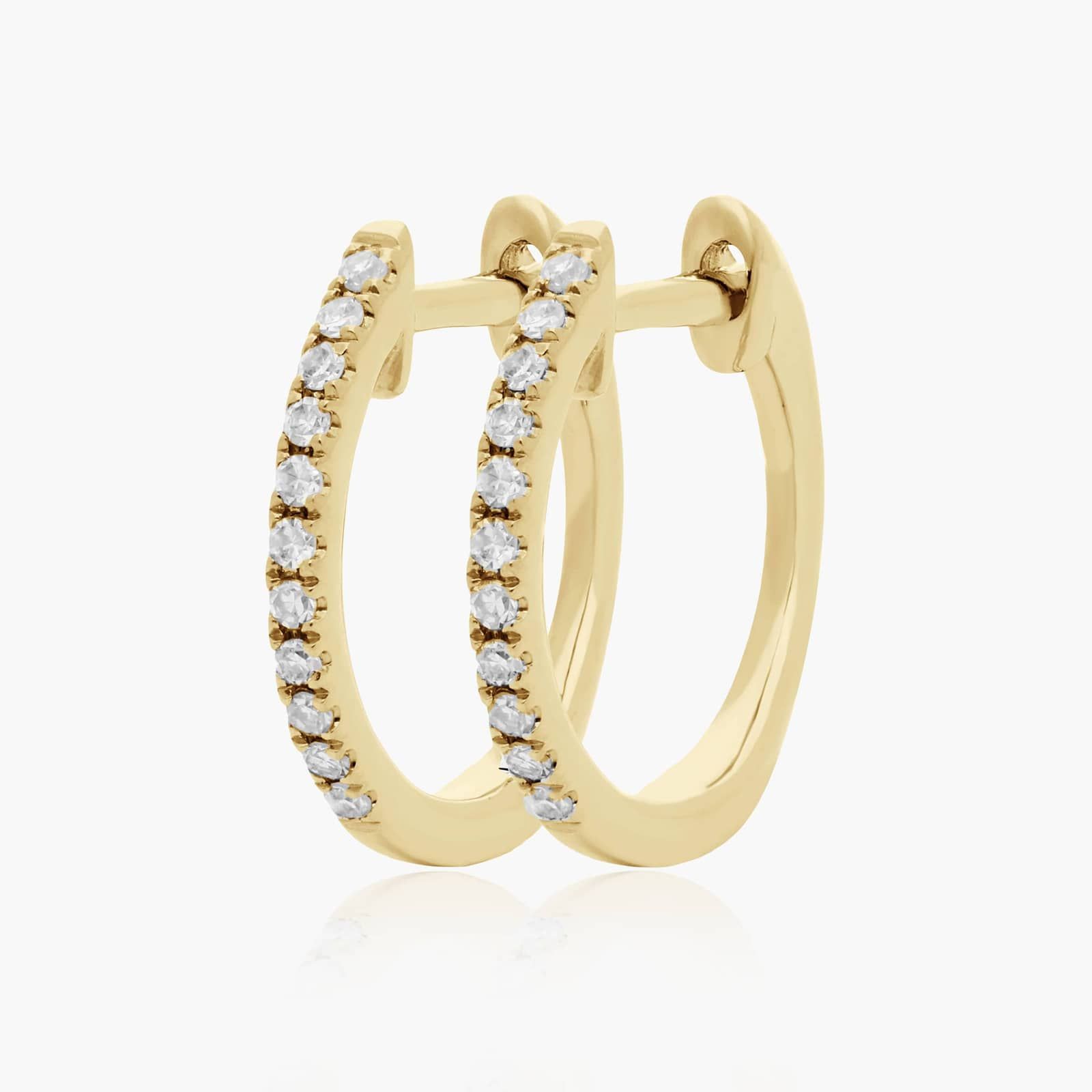 Dainty Pavé Diamond Huggie Earrings In 14K Yellow Gold