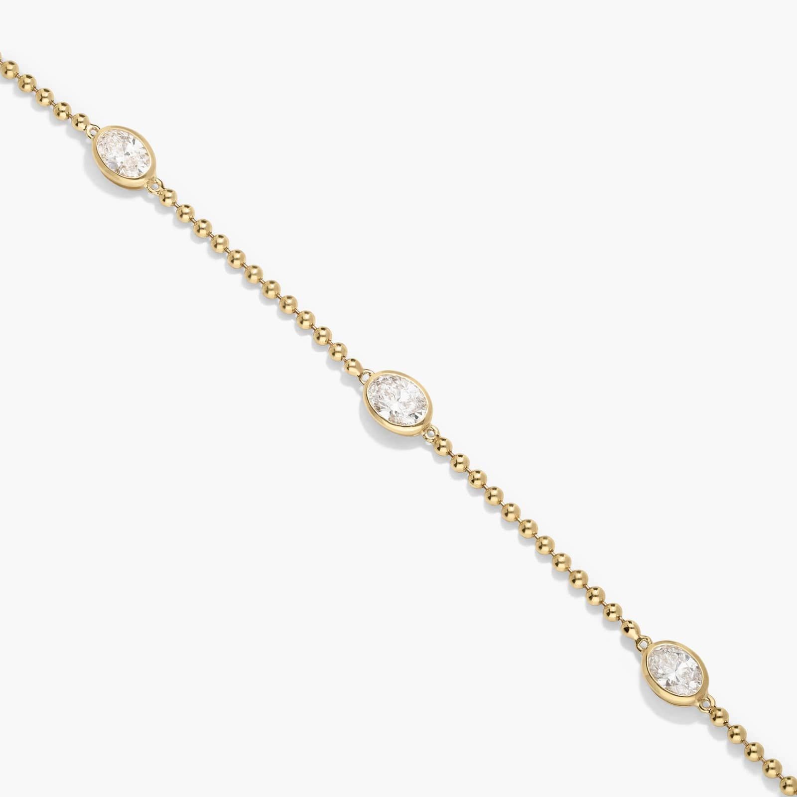 East-West Bezel Beaded Station Bracelet With 1 CTW Oval Cut Lab-Grown Diamonds in 14K Yellow Gold
